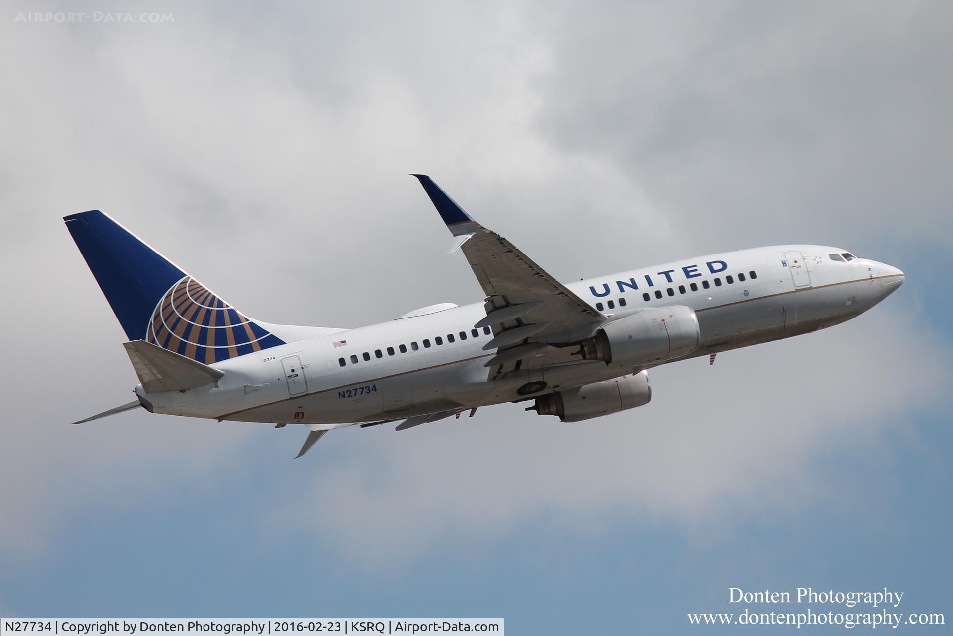 N27734, 1999 Boeing 737-724 C/N 28949, United Flight 1641 (N27734) departs Sarasota-Bradenton International Airport enroute to Chicago-O'Hare International Airport