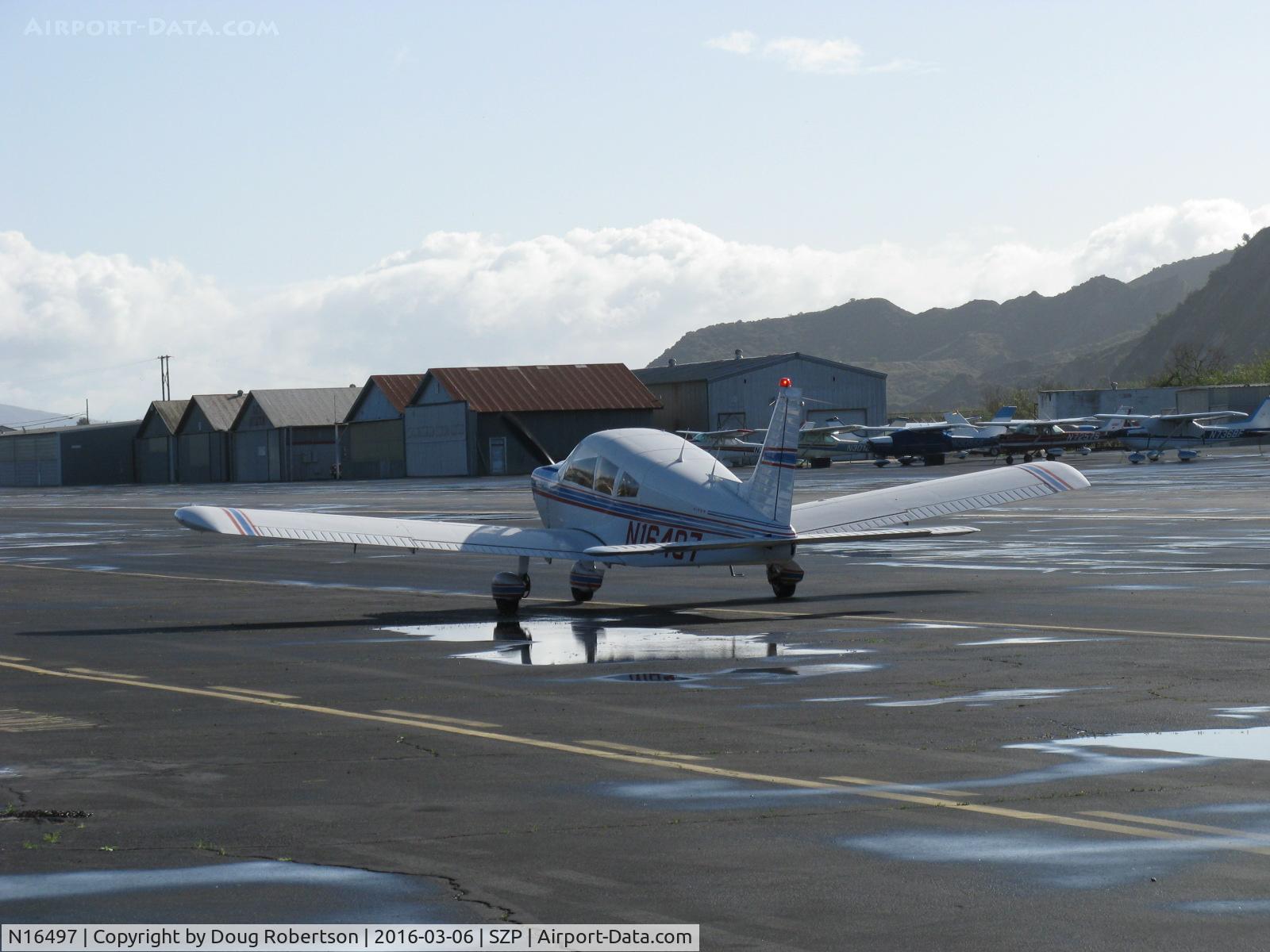 N16497, 1973 Piper PA-28-235 Cherokee Charger C/N 28-7310101, 1973 Piper PA-28-235 CHEROKEE CHARGER, Lycoming O-235-D4B5 235 Hp, taxi back-arriving to give Young Eagles rides