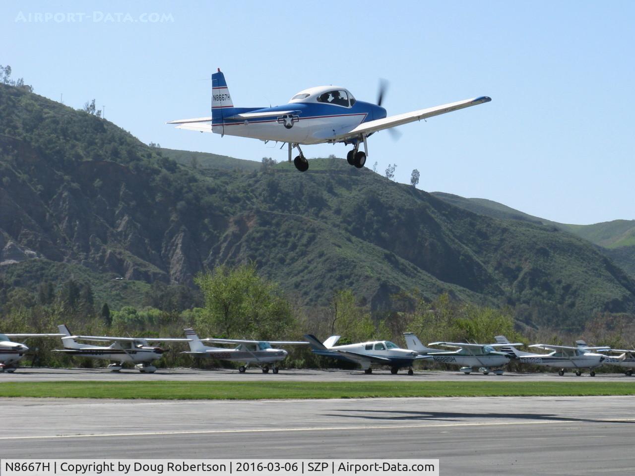 N8667H, 1947 North American Navion C/N NAV-4-667, 1947 North American NAVION, Continental IO-520 285 Hp upgrade, takeoff climb Rwy 22, gear coming up, Young Eagles flight
