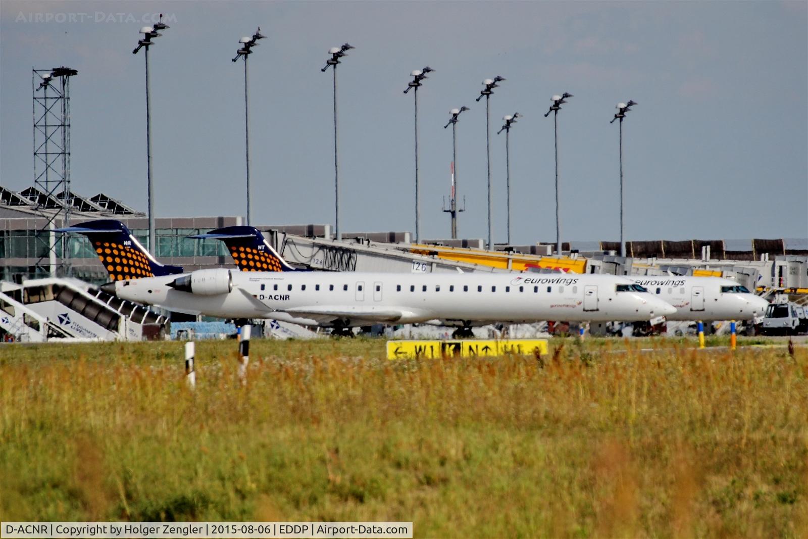 D-ACNR, 2011 Bombardier CRJ-900LR (CL-600-2D24) C/N 15263, Twins on apron 1 west....