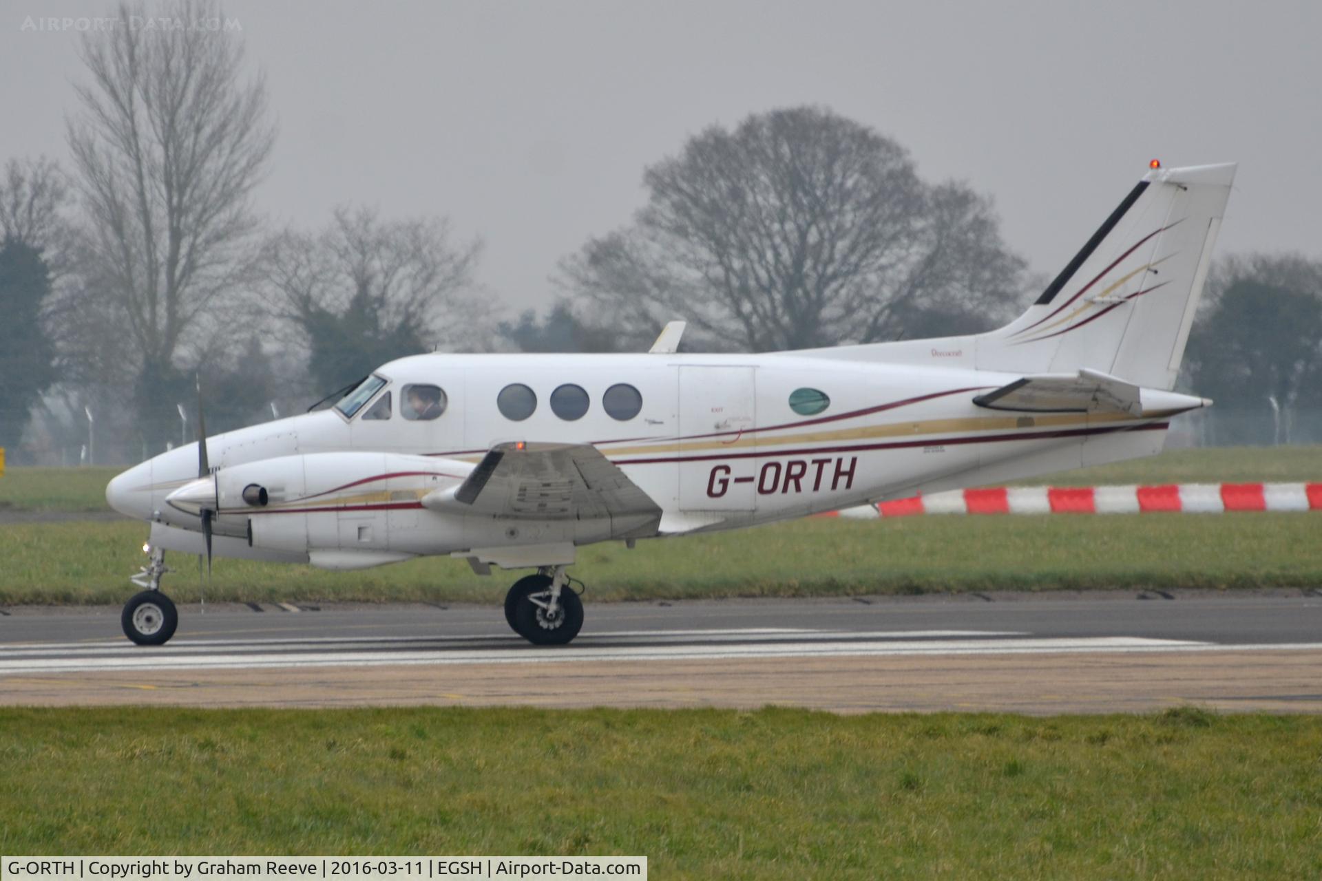 G-ORTH, 1975 Beech E90 King Air C/N LW-136, About to depart on runway 