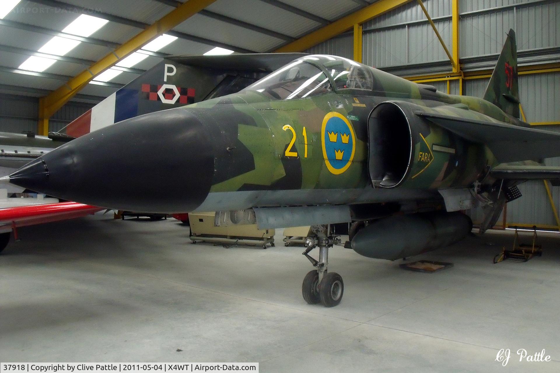 37918, Saab AJSH 37 Viggen C/N 37918, Inside one of the display hangars at the Newark Air Museum, Winthorpe, Nottinghamshire. X4WT