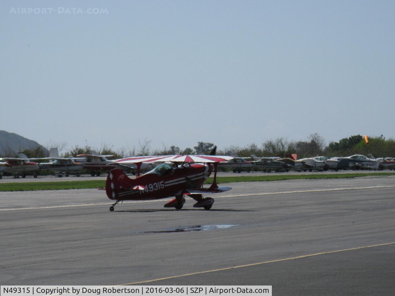N49315, 1983 Pitts S-1T Special C/N 1013, 1983 Pitts Aerobatics S-1T SPECIAL, Lycoming AEIO-360 180 Hp, production airplane, taxi off the active to its hangar.