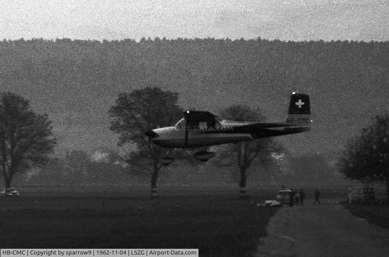 HB-CMC, 1959 Cessna 175 Skylark C/N 56111, Landing runway 07 on a winter evening. Original paint scheme. Scanned from b/w negative.