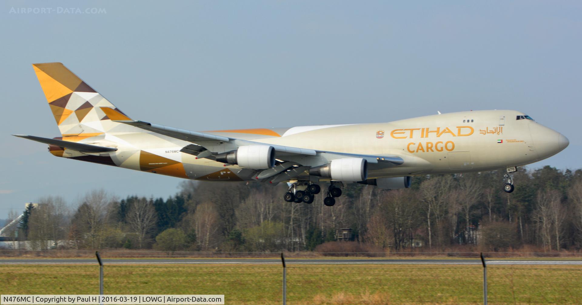 N476MC, 1999 Boeing 747-47UF C/N 29256, Golden Etihad Cargo B747-400F with RedBull Airrace aircrafts in its belly, landing at LOWG, Graz