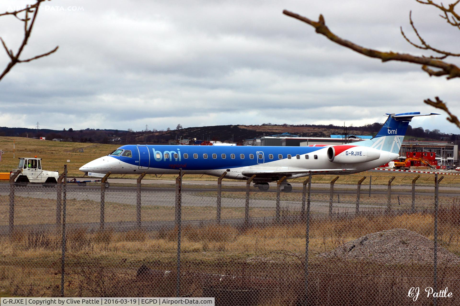 G-RJXE, 2000 Embraer EMB-145EP (ERJ-145EP) C/N 145245, Being towed from the BMI engineering hangar to the Terminal at Aberdeen EGPD