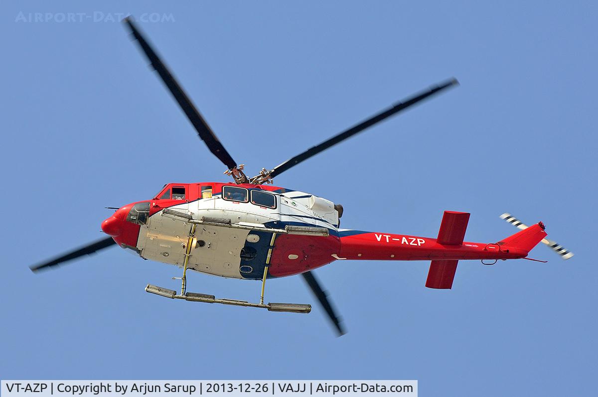 VT-AZP, 2006 Bell 412EP C/N 36407, Flying over Juhu beach.