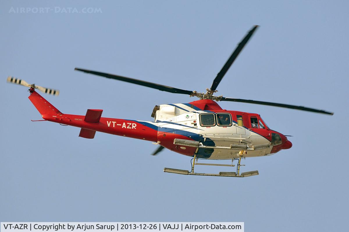VT-AZR, 2006 Bell 412EP C/N 36415, Flying over Juhu beach.