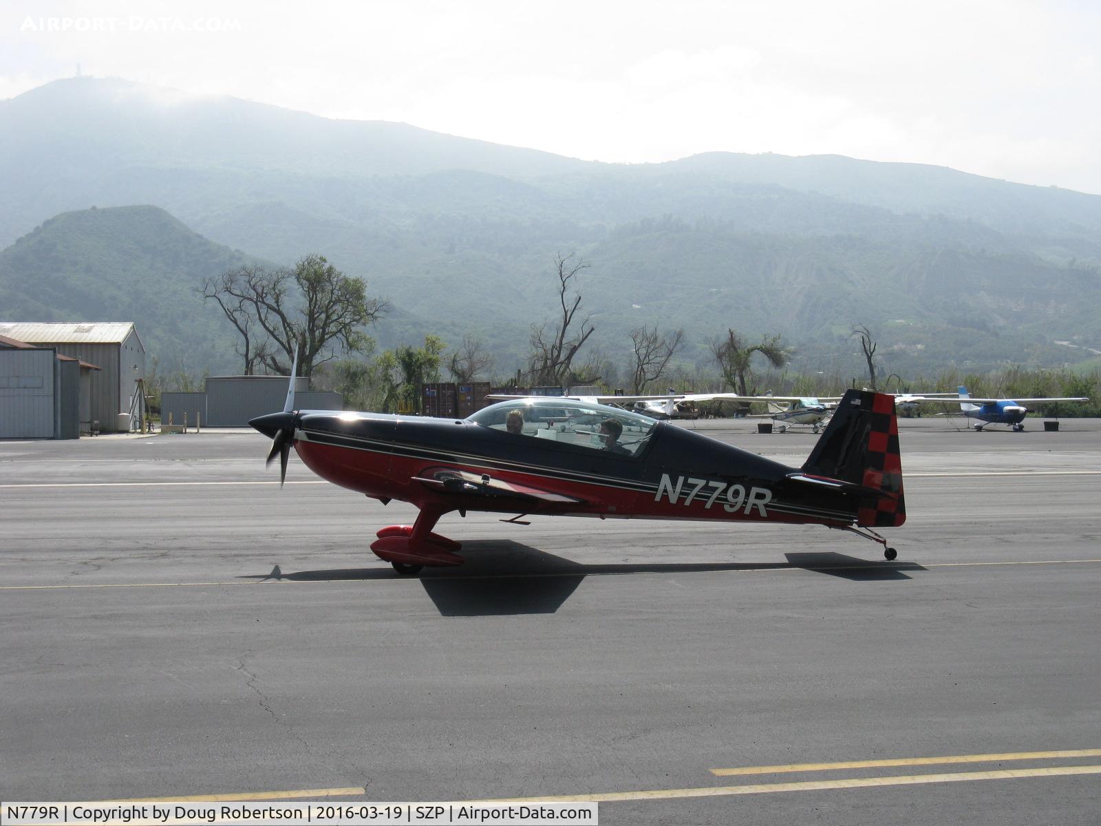 N779R, 2005 Extra EA-300/L C/N 1218, 2005 Extra Flugzeugbau GMBH EXTRA EA300/L, Lycoming AEIO-540-L1B5 300 Hp, 3 blade CS prop, fully aerobatic low wing version, taxi to Rwy 22. Extra also has a EA300/S short-wing version and an EA300 mid-wing version.