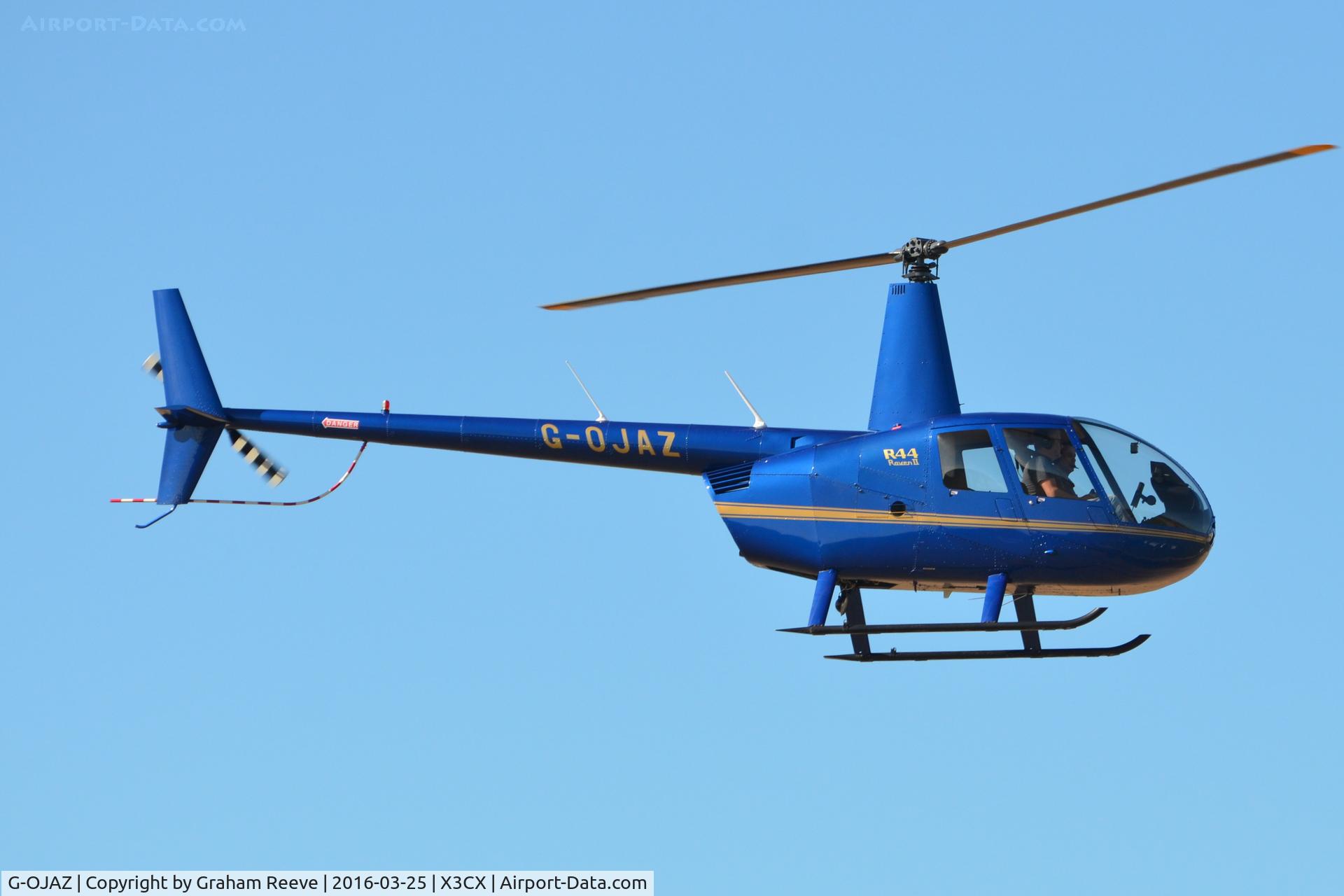 G-OJAZ, 2006 Robinson R44 Raven II C/N 11216, About to land at Northrepps.