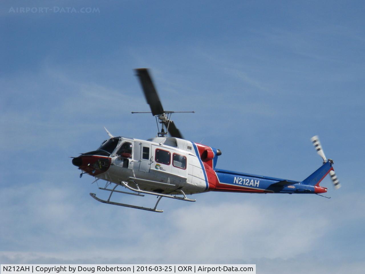 N212AH, 1979 Bell 212 C/N 30959, 1979 Bell 212 TWIN-TWO-TWELVE, P&W(C)PT6T-3 TWIN-PAC coupled free-turbine Turboshaft 1,800 shp, approach to landing Aspen Helicopters, Inc. ramp adjacent Rwy 25