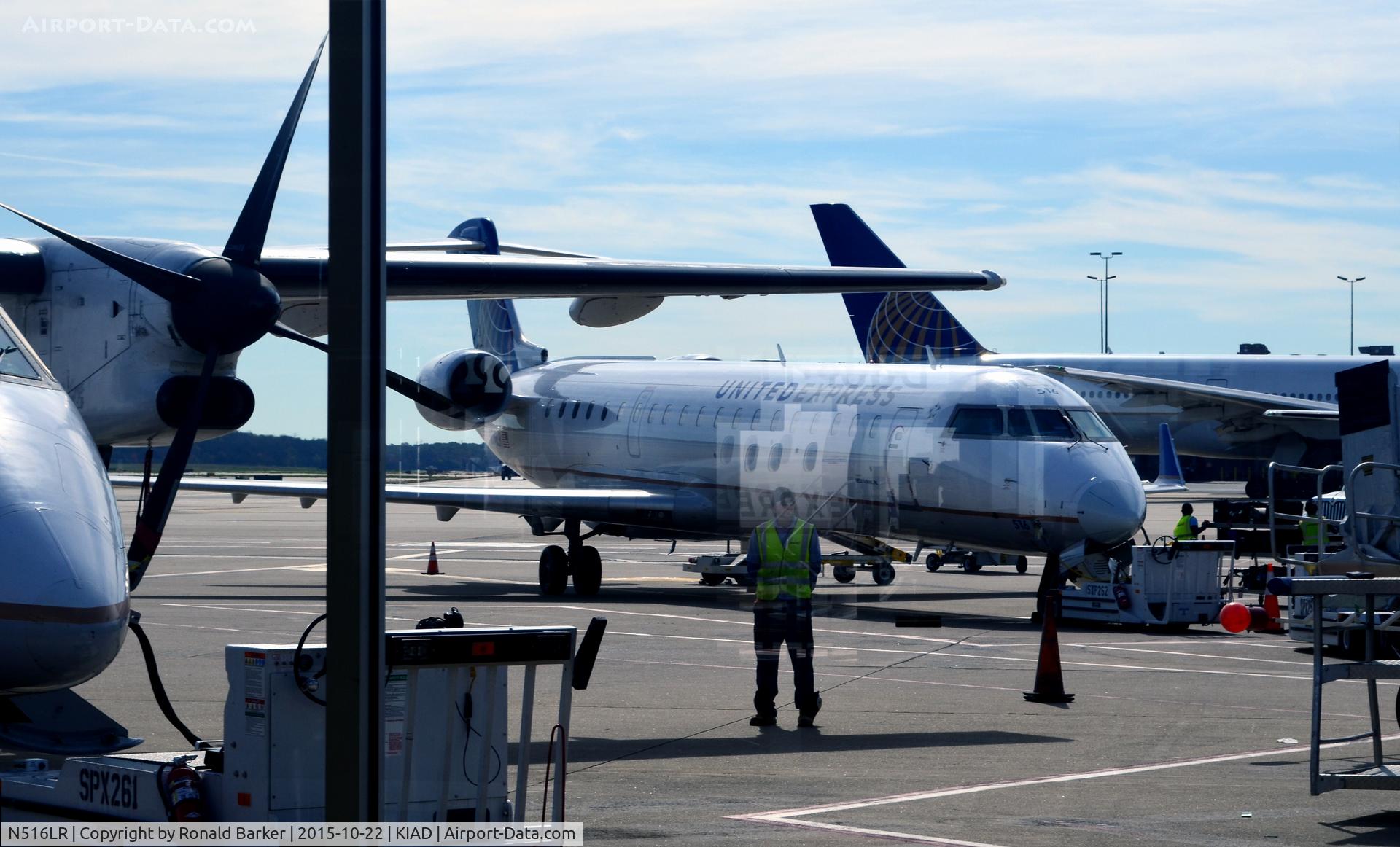N516LR, 2006 Bombardier CRJ-700 (CL-600-2C10) Regional Jet C/N 10258, At the gate Dulles