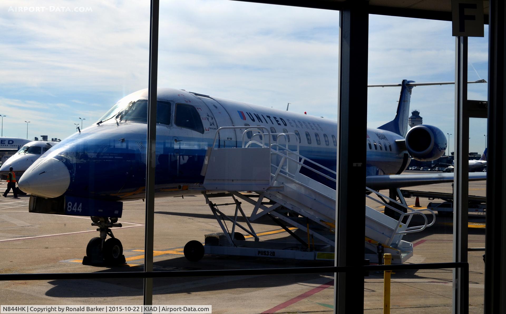 N844HK, 2004 Embraer ERJ-145LR (EMB-145LR) C/N 14500838, At the gate Dulles