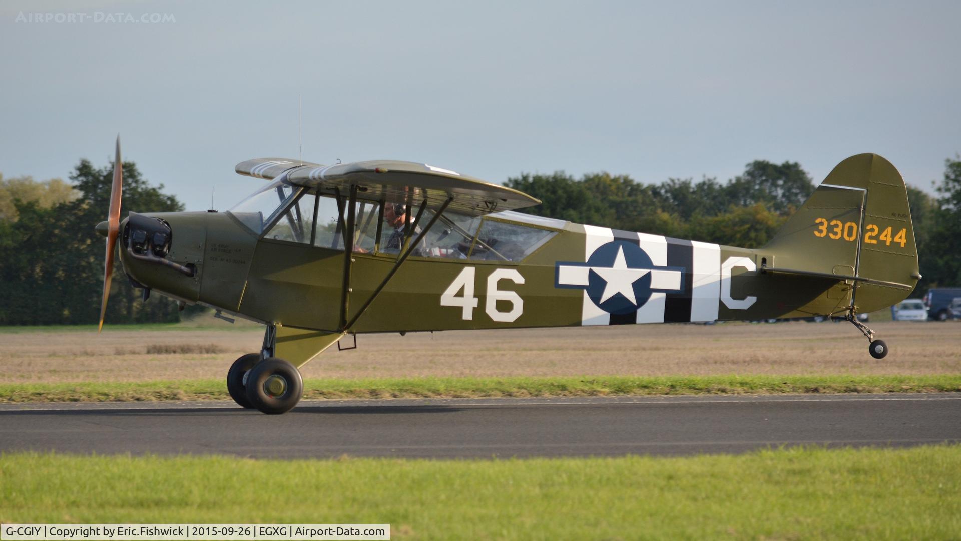 G-CGIY, 1943 Piper L-4H Grasshopper (J3C-65D) C/N 11535, X. 330244 departing The Yorkshire Air Show, Church Fenton, Sept. 2015.