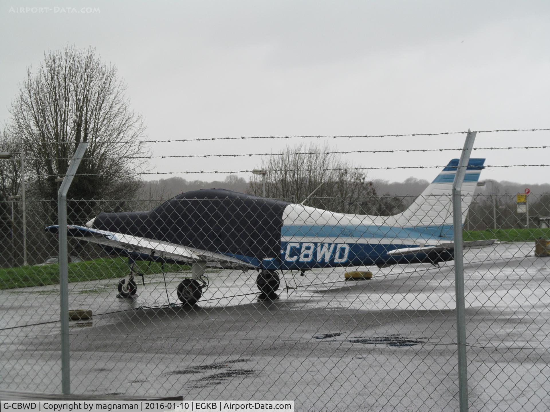 G-CBWD, 2002 Piper PA-28-161 Cherokee Warrior III C/N 2842160, on wet biggin apron