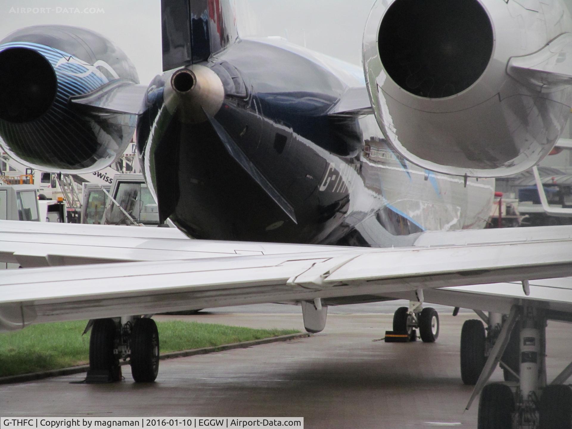 G-THFC, 2006 Embraer EMB-135BJ Legacy C/N 14500954, My team's jet at luton where too many biz and bad fencing make photos very difficult!