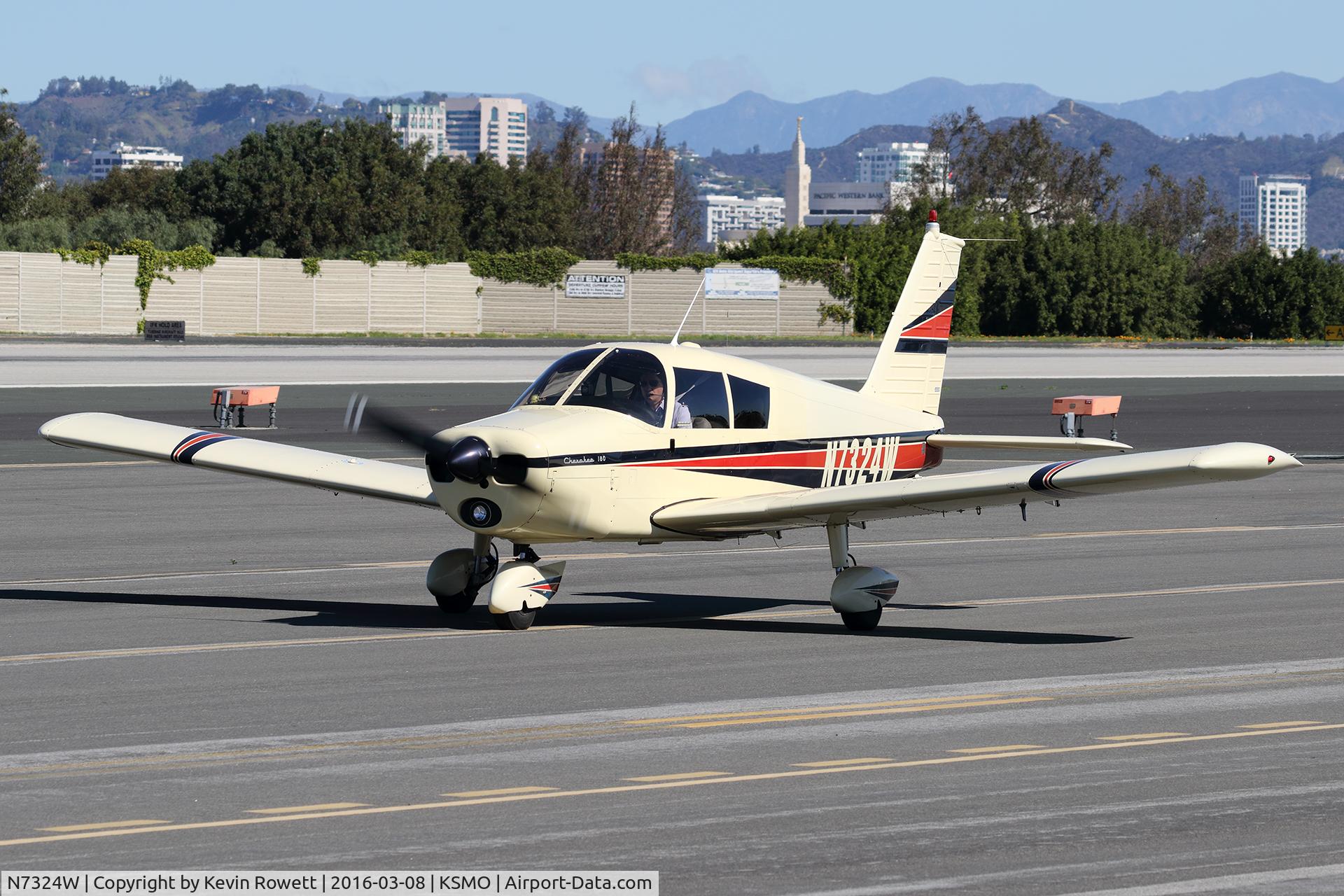 N7324W, 1963 Piper PA-28-180 C/N 28-1193, Taxiing for departure at Santa Monica.