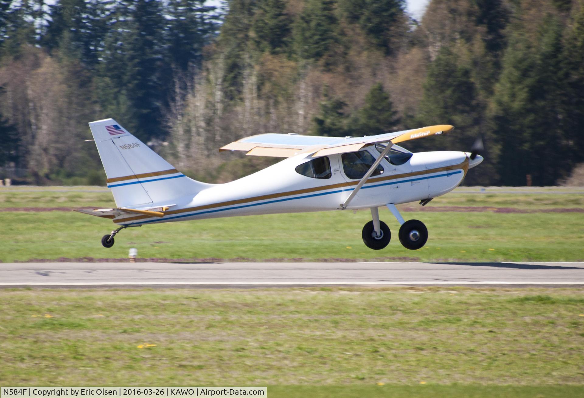 N584F, 2000 Stoddard-Hamilton Glastar GS-1 C/N 5084, GS-1 taking to the sky at the Arlington Airport.