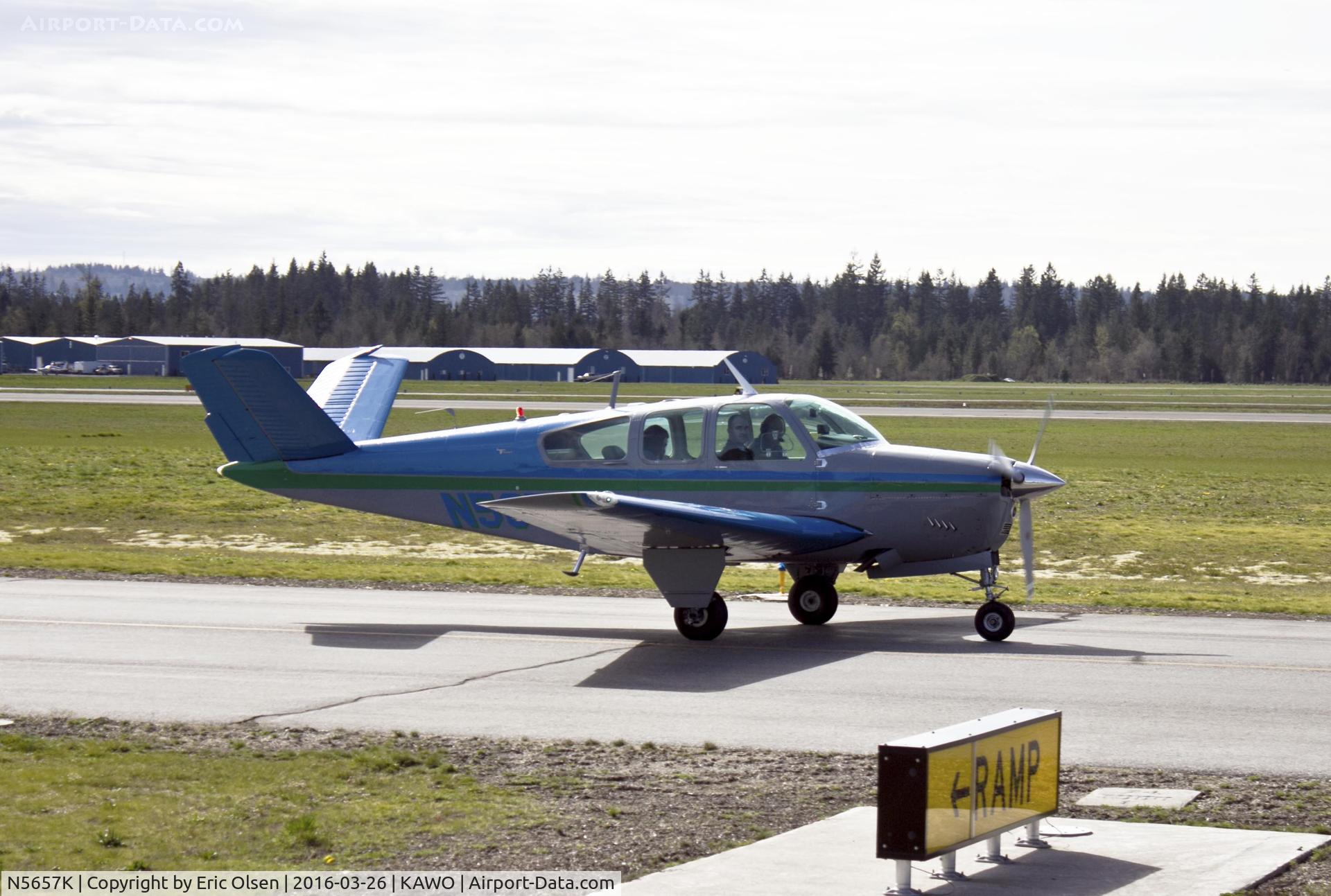 N5657K, 1964 Beech S35 Bonanza C/N D-7593, Beech S35 taxing by Ellies at the Airport.