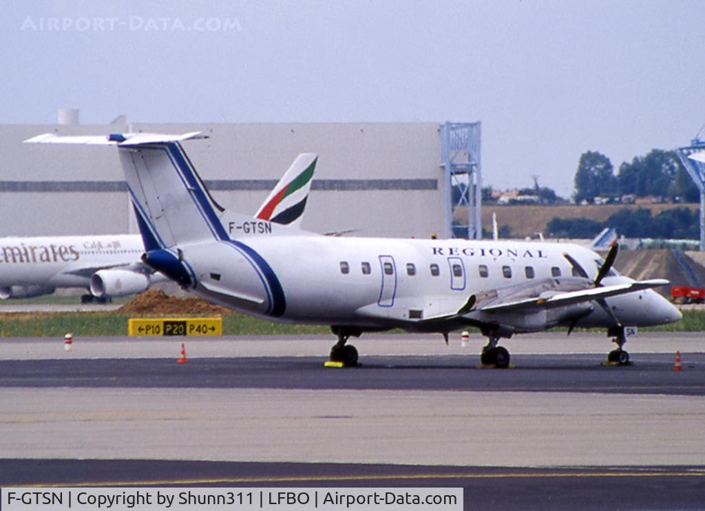 F-GTSN, 1988 Embraer EMB-120ER Brasilia C/N 120099, Parked at the General Aviation area without logo on tail...