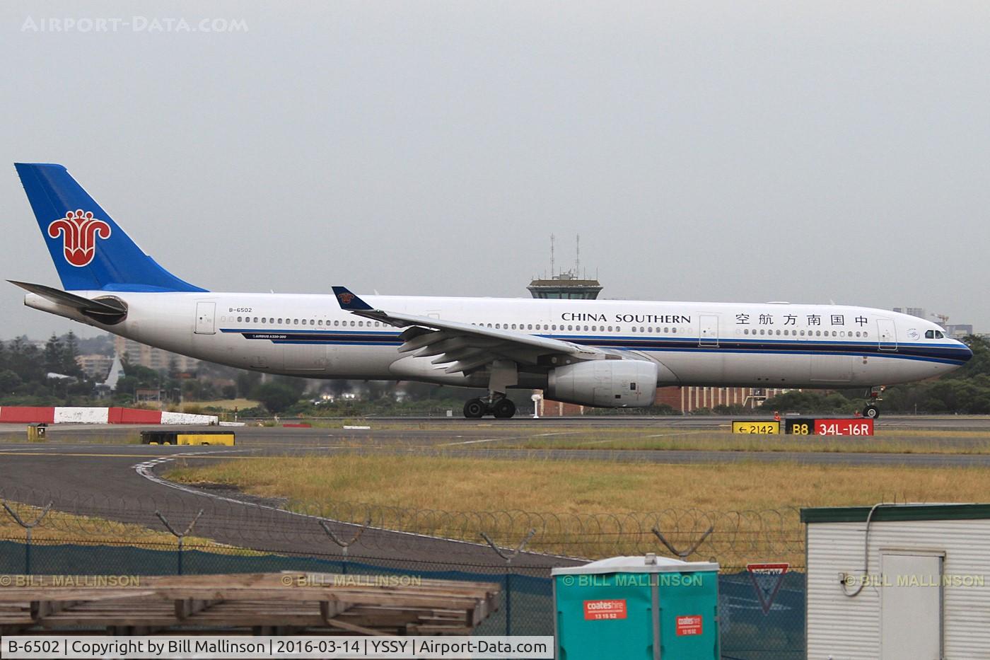B-6502, 2008 Airbus A330-343E C/N 958, taxiing from 34L
