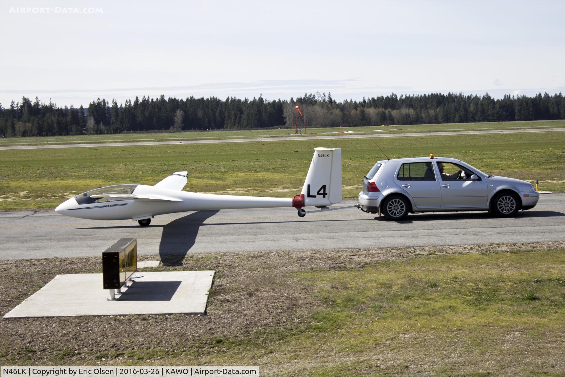 N46LK, Rolladen-schneider LS 4A C/N 4411, LS 4A glider being towed on the east side of KAWO.