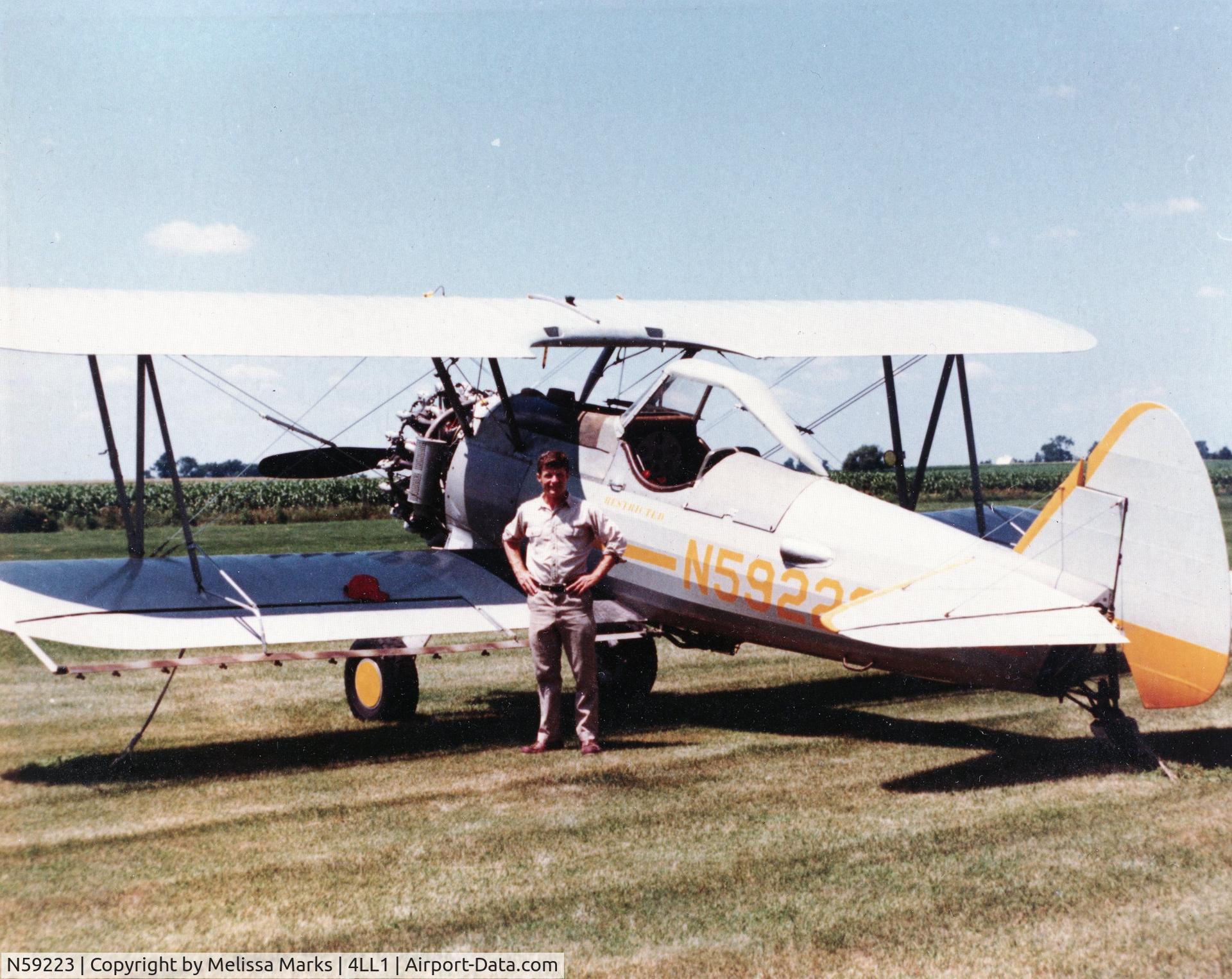 N59223, 1942 Boeing A75N1(PT17) C/N 75-2740, Staton Aerial Service, Steward, IL   Pilot:  Mike Marks    Late 1970's