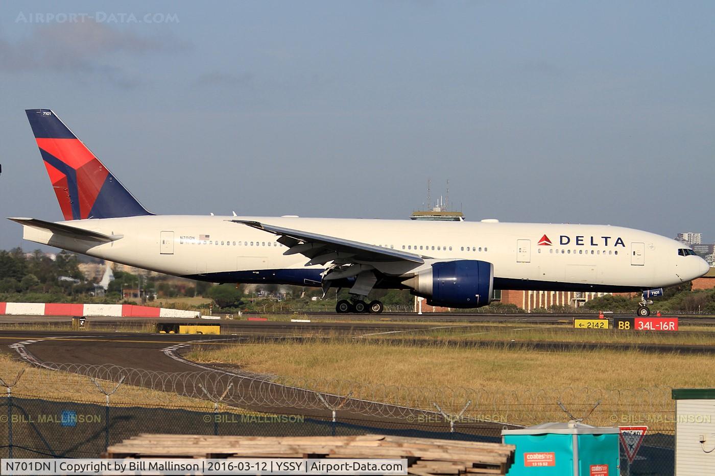 N701DN, 2008 Boeing 777-232/LR C/N 29740, taxiing from 34L