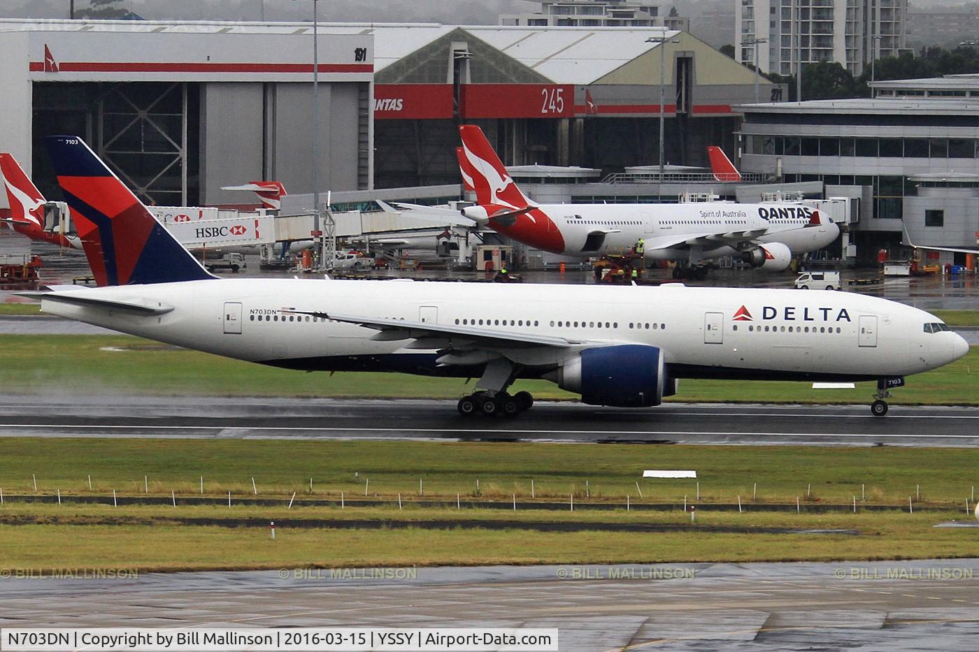 N703DN, 2009 Boeing 777-232/LR C/N 32222, rolling on 16R