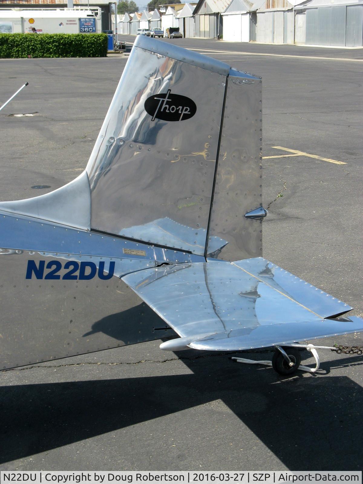 N22DU, 1977 Thorp T-18 Tiger C/N 22, 1977 Thorp T-18 TIGER, Lycoming O-290, empennage, highly polished aluminum with logo. First flight of a T-18 was in May 1964.