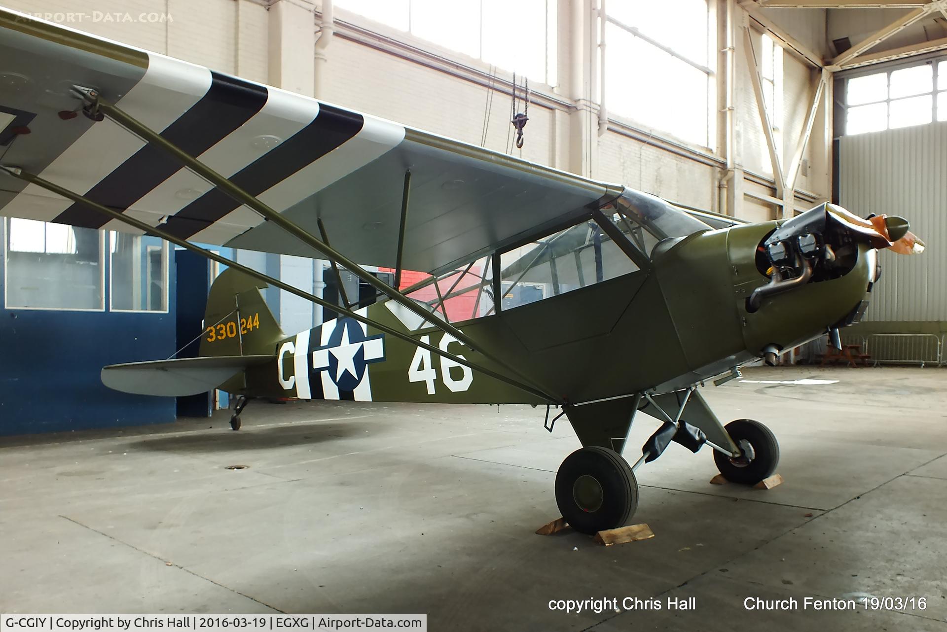 G-CGIY, 1943 Piper L-4H Grasshopper (J3C-65D) C/N 11535, hangared at Church Fenton