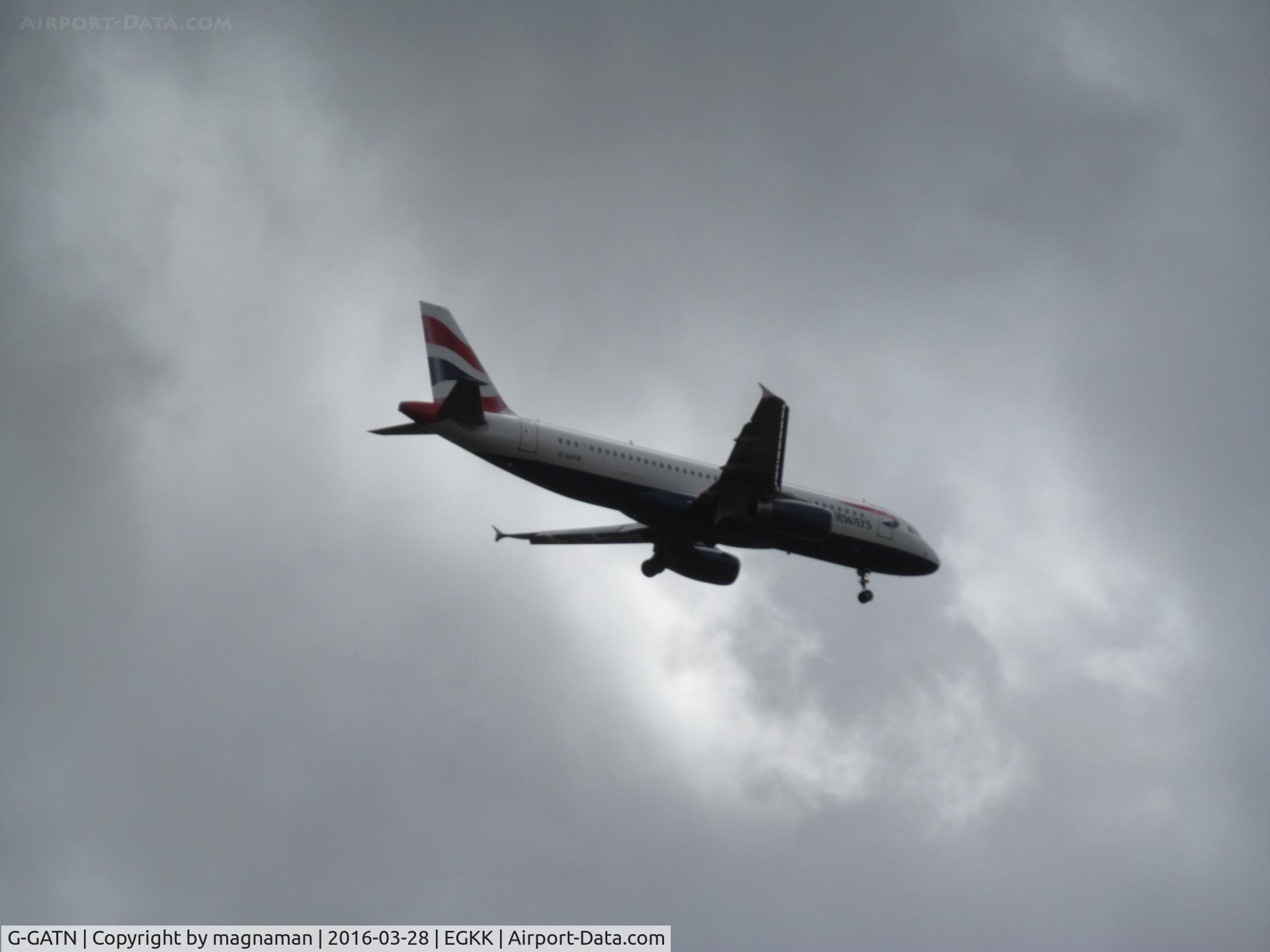 G-GATN, 2001 Airbus A320-232 C/N 1613, landing at blustery LGW