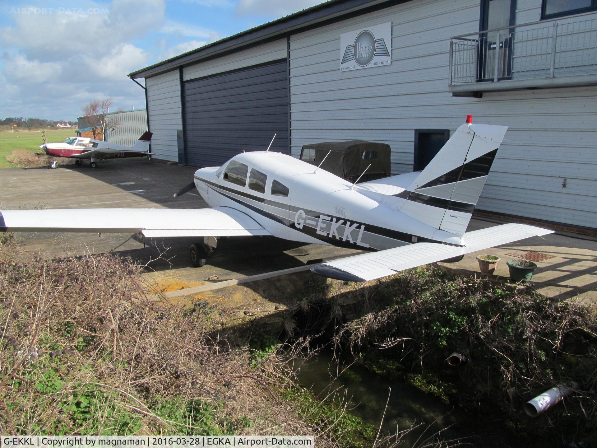 G-EKKL, 1984 Piper PA-28-161 Warrior II C/N 28-8416087, hiding at back of hangars