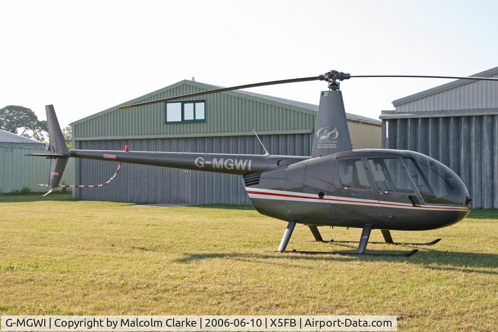 G-MGWI, 2000 Robinson R44 Astro C/N 0663, Robinson R44 Astro, Fishburn Airfield, June 2006.