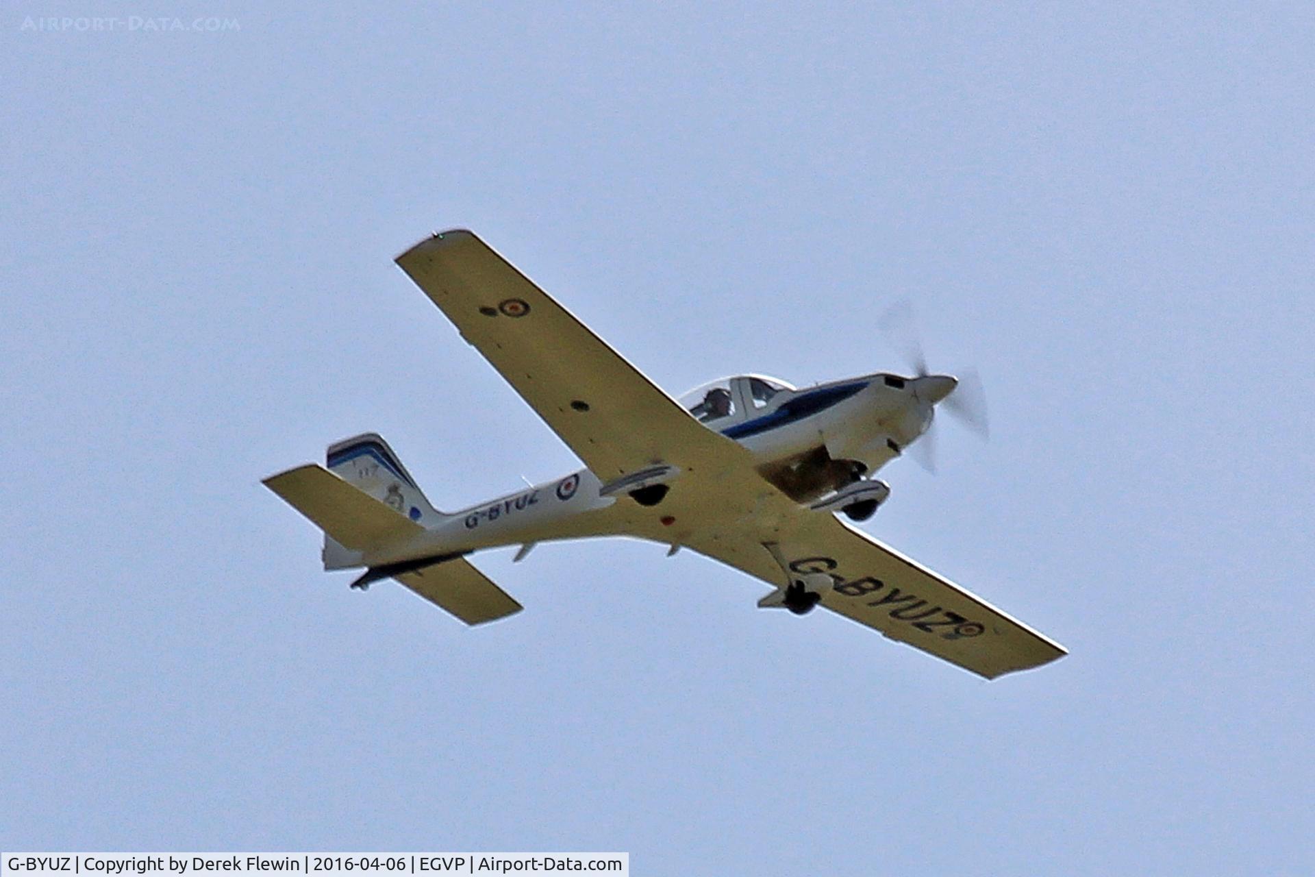 G-BYUZ, 2000 Grob G-115E Tutor T1 C/N 82110/E, Tutor, coded UZ, Royal Air Force Barksten Heath based, currently attached to the Elementary Flying Traing school, seen in the overhead.
