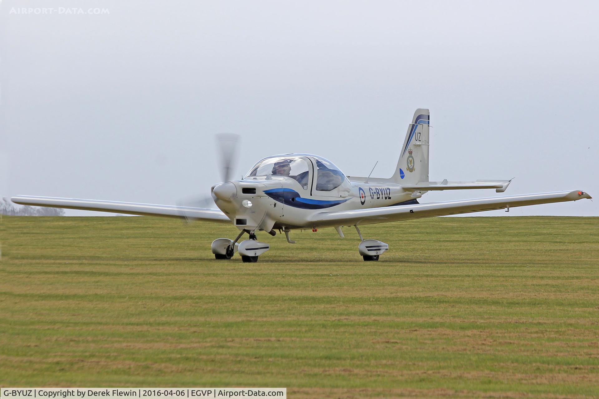 G-BYUZ, 2000 Grob G-115E Tutor T1 C/N 82110/E, Tutor, coded UZ, Royal Air Force Barksten Heath based, currently attached to the Elementary Flying Training school, seen taxxing in.
