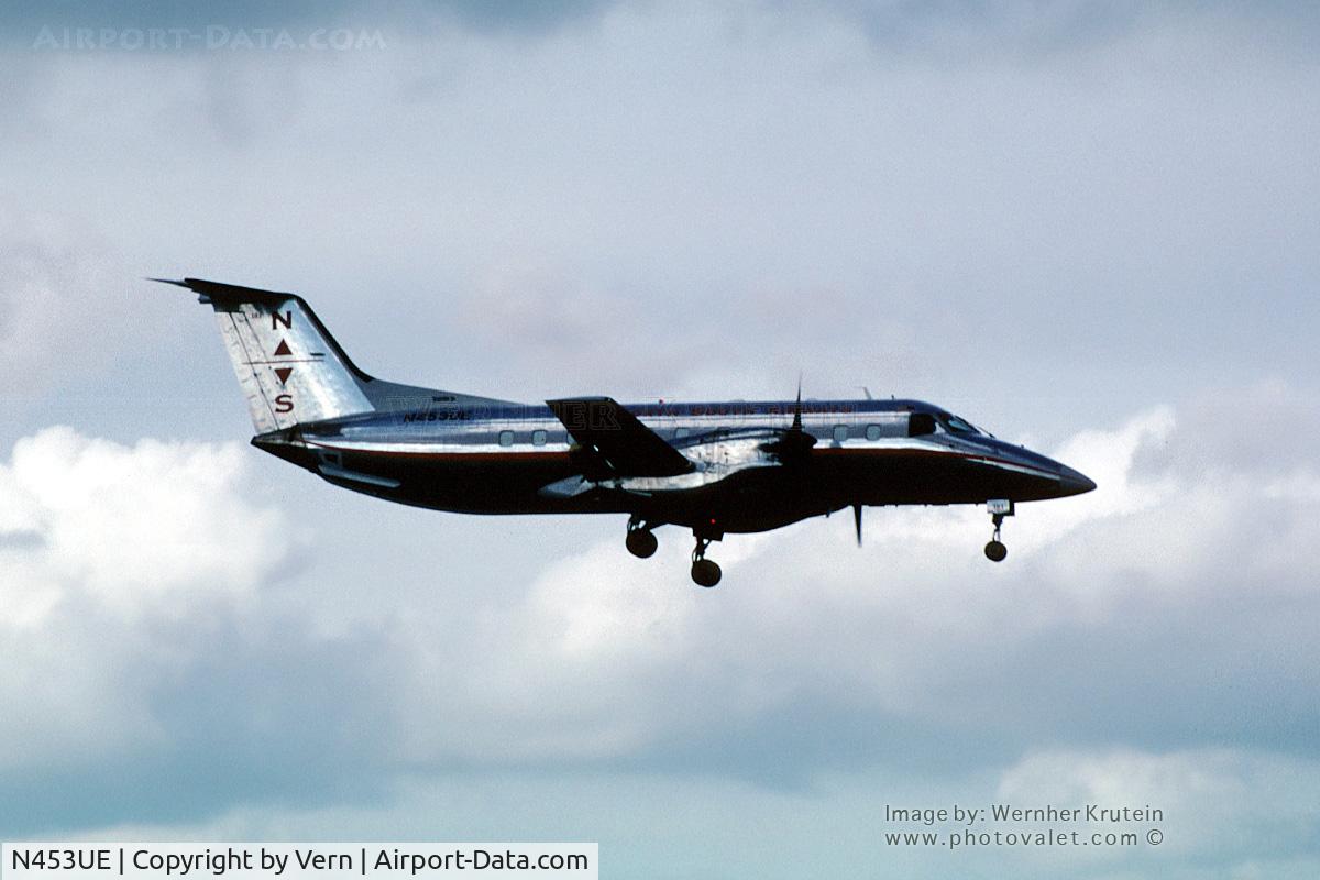 N453UE, 1989 Embraer EMB-120FC Brasilia C/N 120.148, N453UE on final