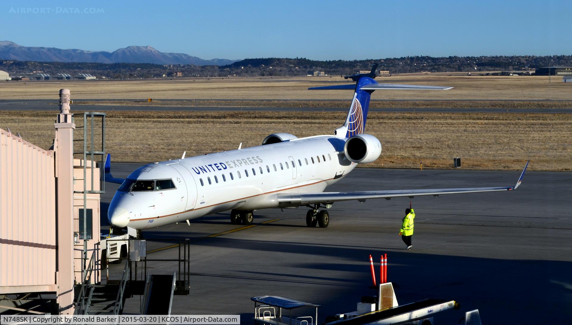 N748SK, 2005 Bombardier CRJ-700 (CL-600-2C10) Regional Jet C/N 10203, At the gate COS