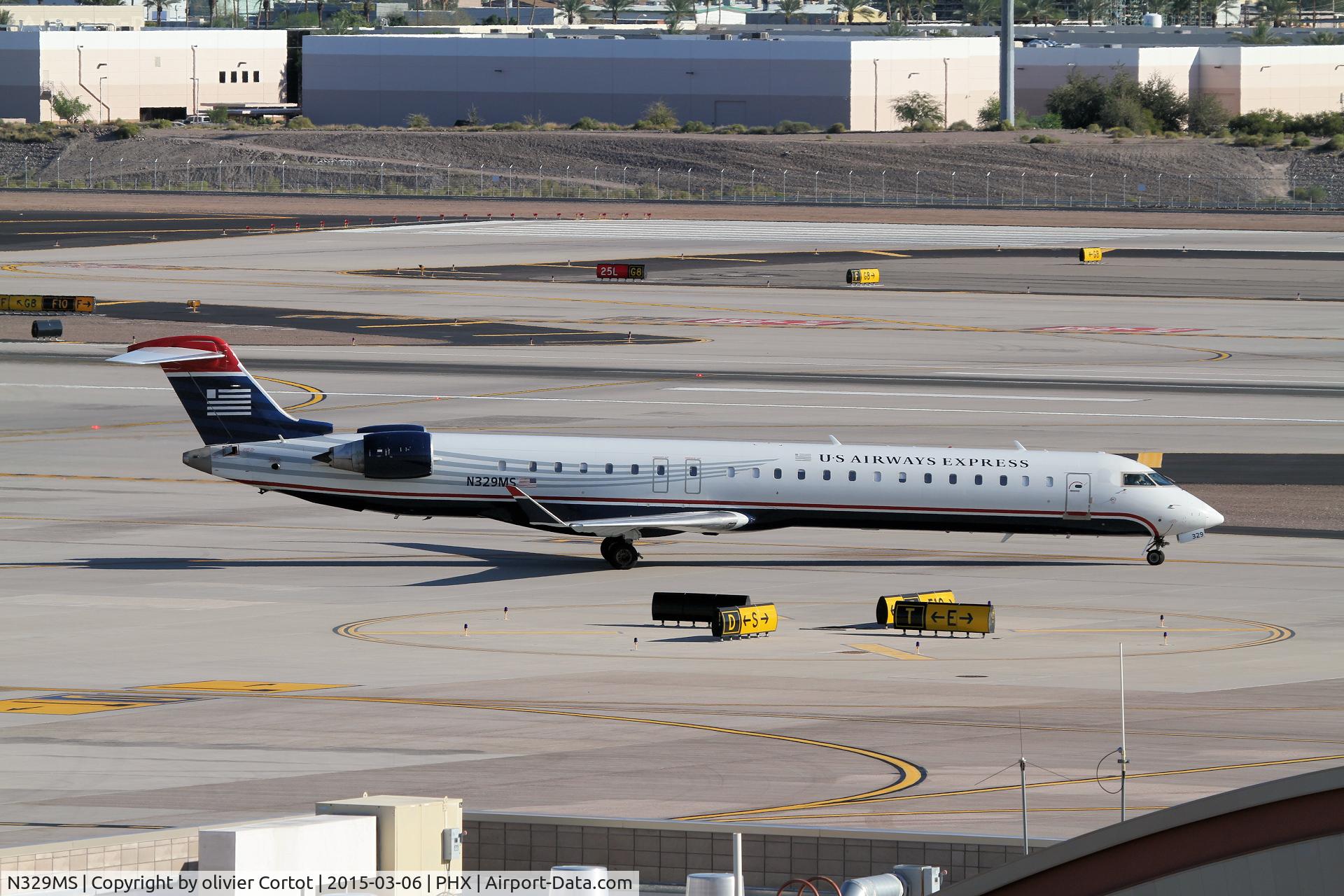 N329MS, 2008 Bombardier CRJ-900ER NG (CL-600-2D24) C/N 15126, about to leave Phoenix