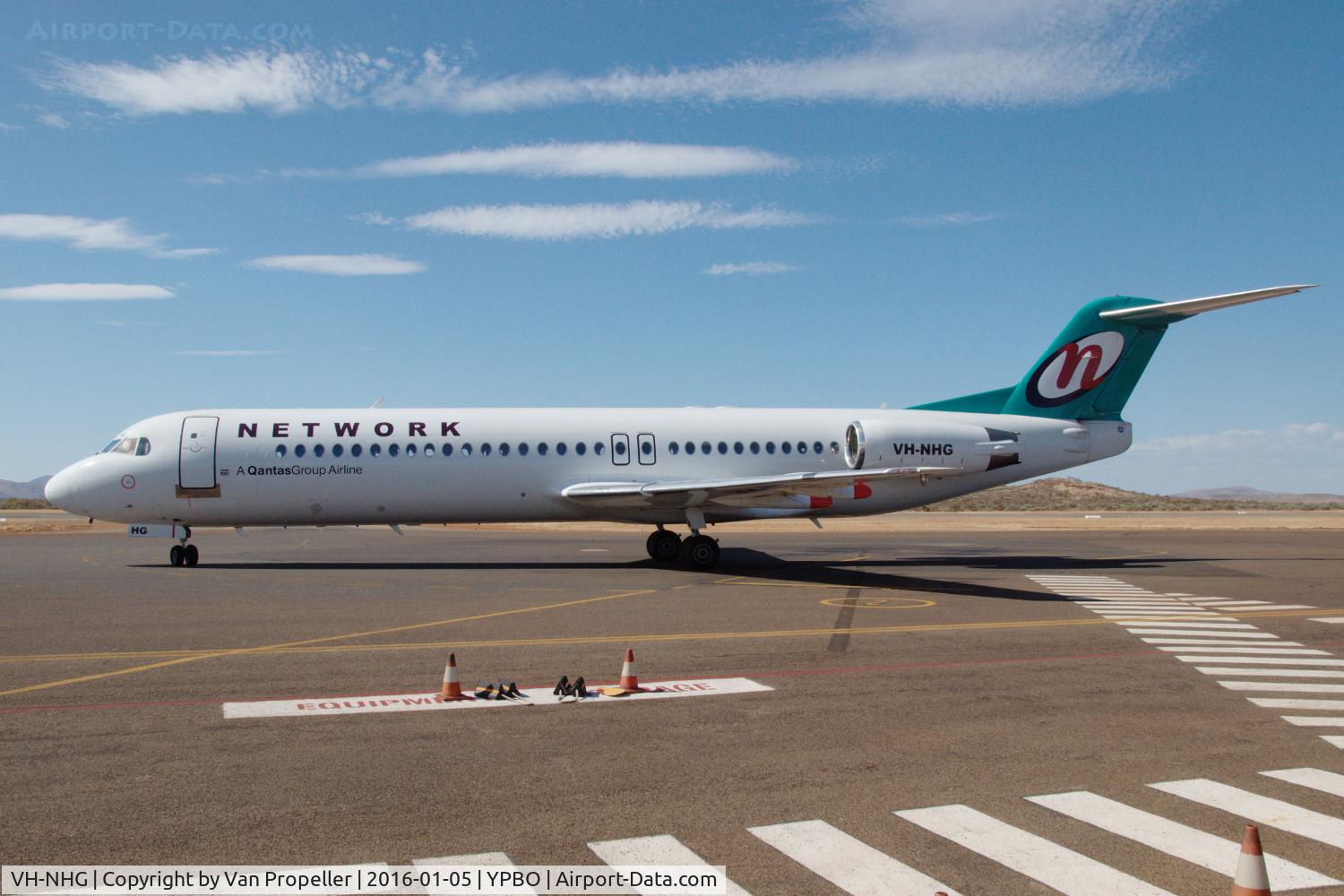 VH-NHG, 1994 Fokker 100 (F-28-0100) C/N 11514, Fokker 100 of Network Aviation taxiing on to the runway of Paraburdoo airport, Western Australia
