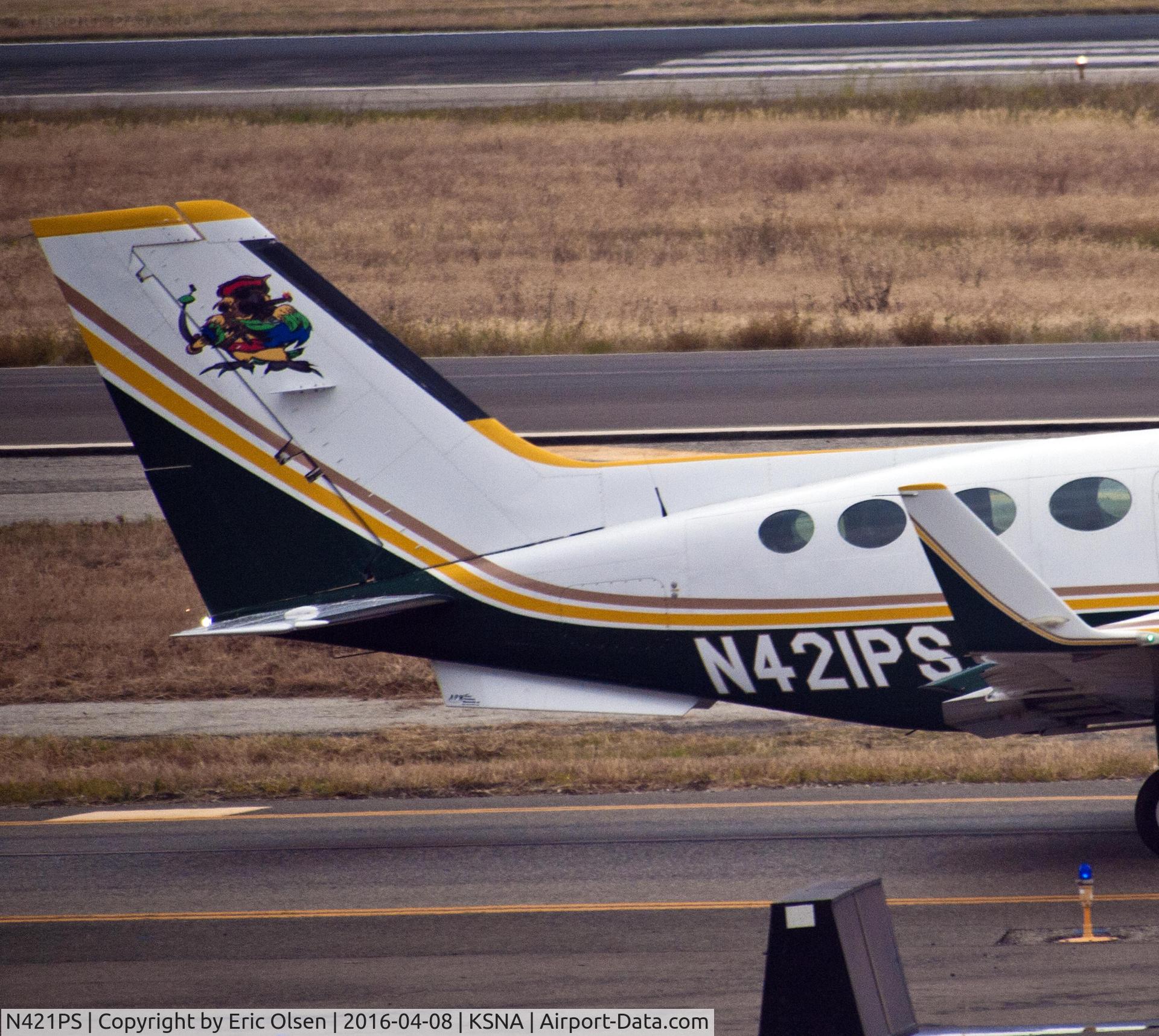 N421PS, 1978 Cessna 421C Golden Eagle C/N 421C0518, This a/c has a parrot for the tail art and is now owned by Always Five Oclock LLC.