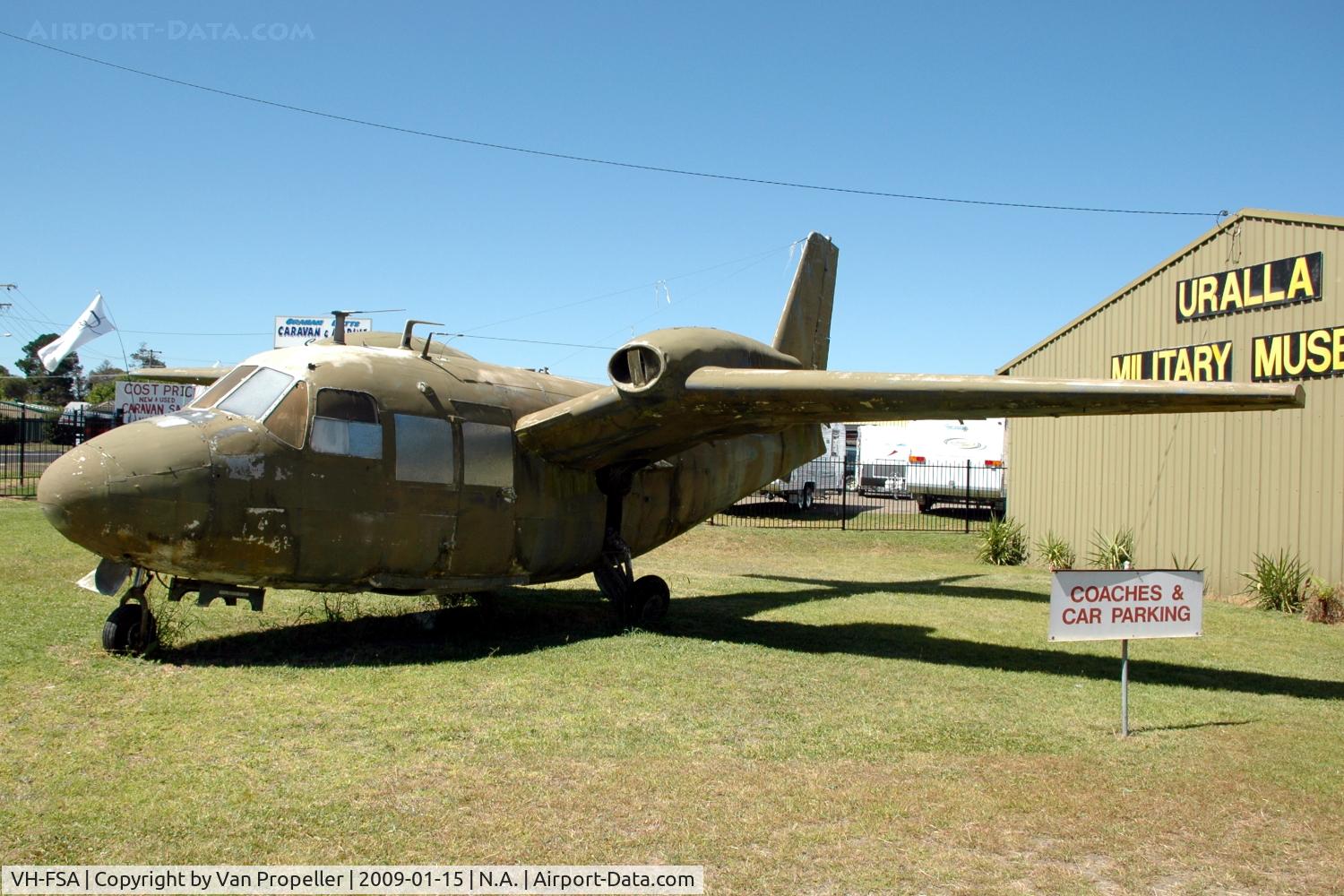 VH-FSA, 1960 Piaggio P-166AL-1 C/N 360, Piaggio P.166AL1 in front of the Uralla Military Museum, NSW, Australia. It was painted khaki in 1988 and was in very bad condition in 2009