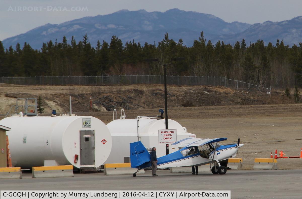 C-GGQH, 1975 Bellanca 8GCBC C/N 175 75, Fueling at Whitehorse, Yukon.