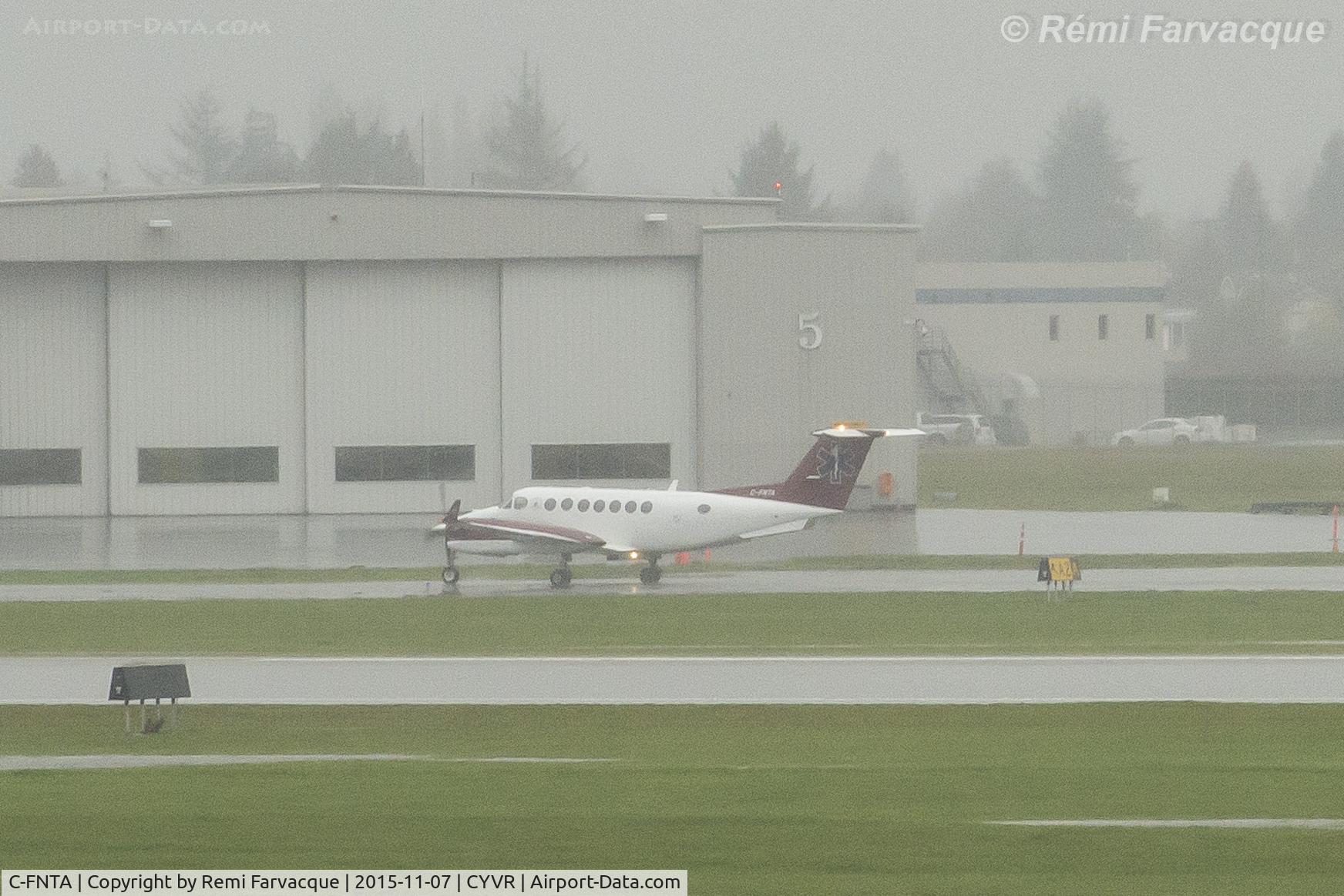 C-FNTA, 2012 Beech B300 King Air C/N FL-806, Taxiing to private hanger. Air ambulance livery.