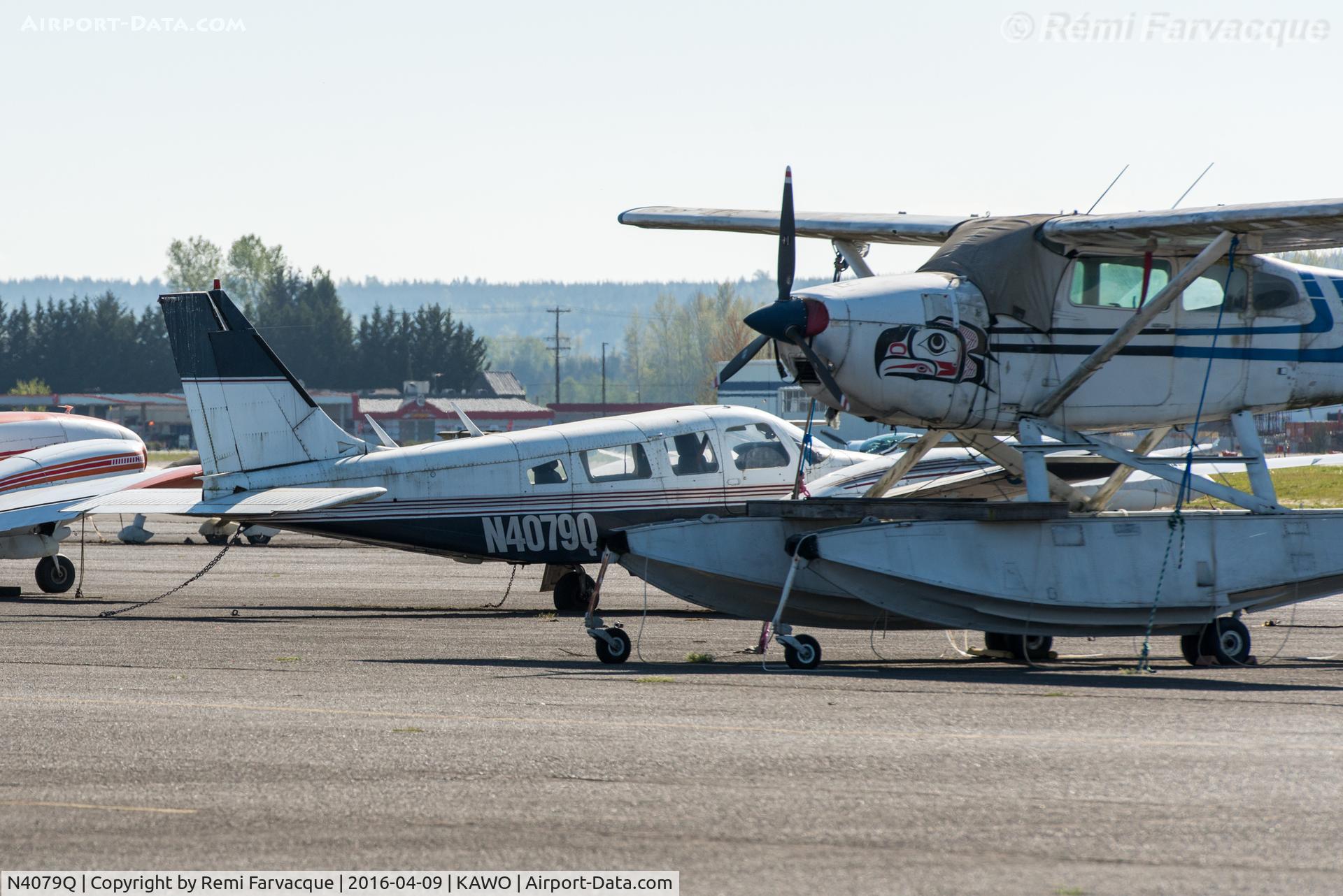 N4079Q, 1977 Piper PA-34-200T C/N 34-7770237, Parked by main terminal building at KAWO (AWO).