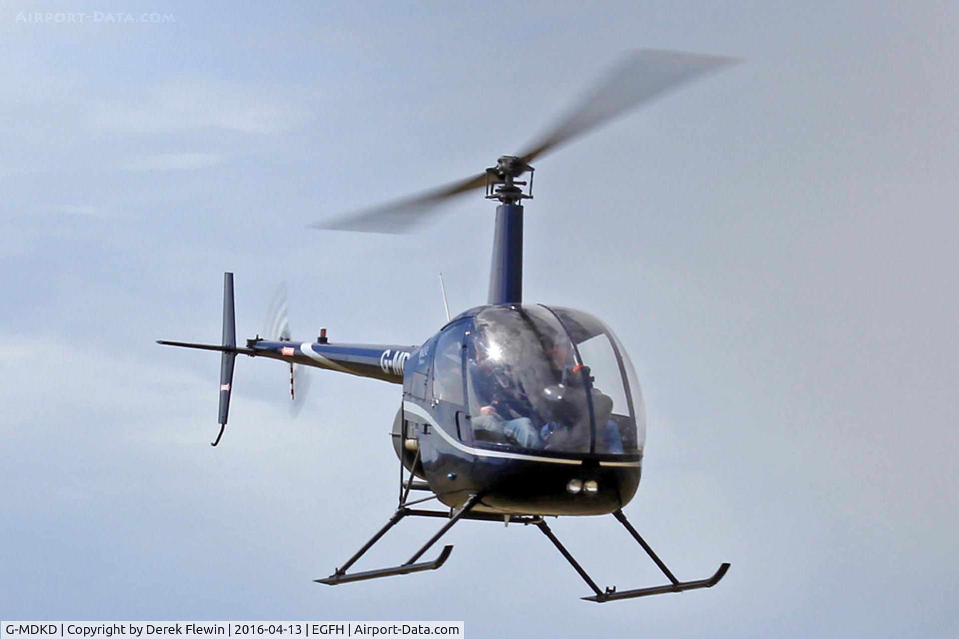 G-MDKD, 1990 Robinson R22 Beta C/N 1247, R22 BETA, Heli-Air Swansea based, seen on a lesson.