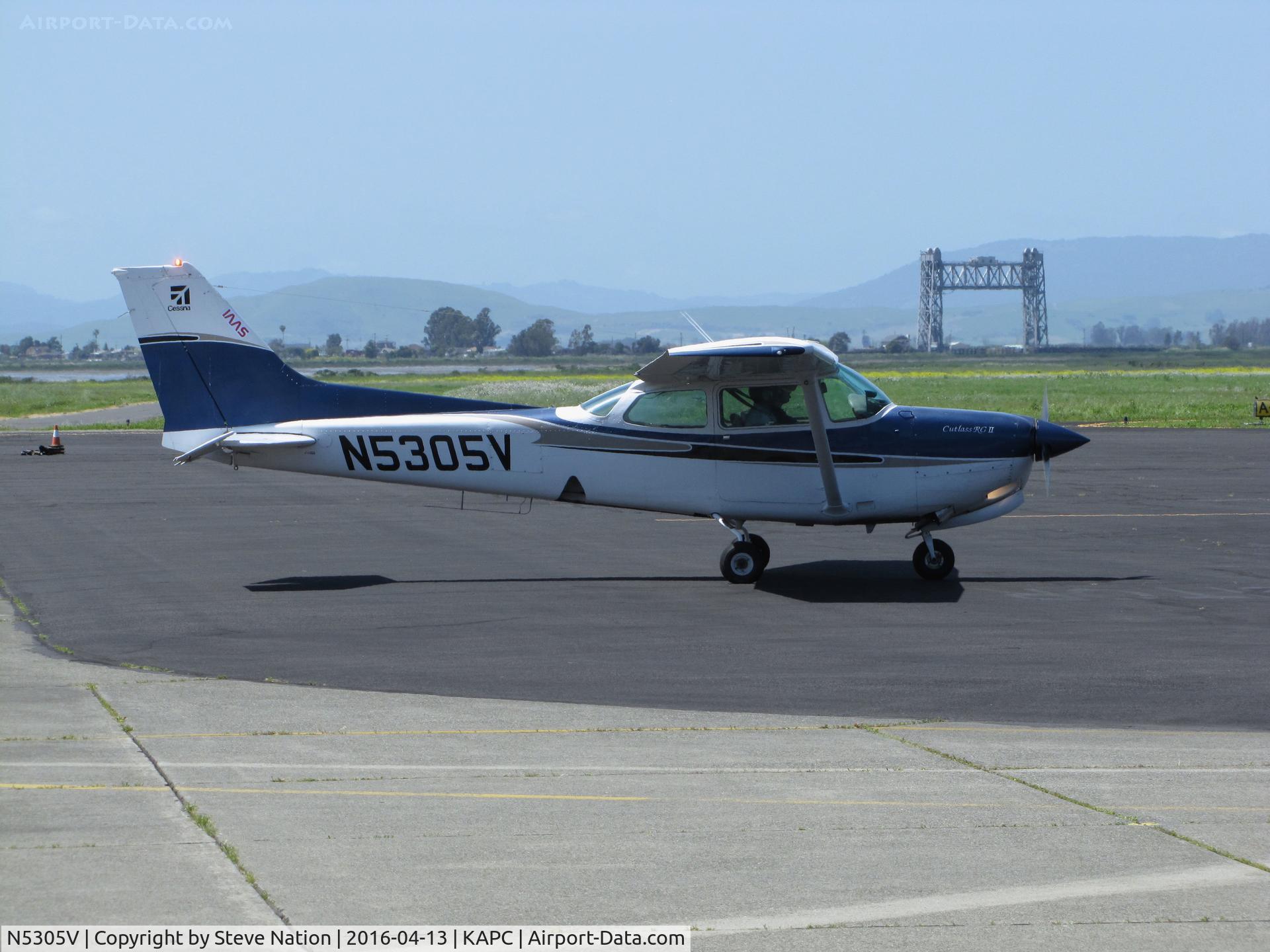 N5305V, 1980 Cessna 172RG Cutlass RG C/N 172RG0504, American Academy of Aeronautics 1980 Cessna 172RG taxis in @ Napa County Airport, CA with the iconic Napa River RR Bridge in background.