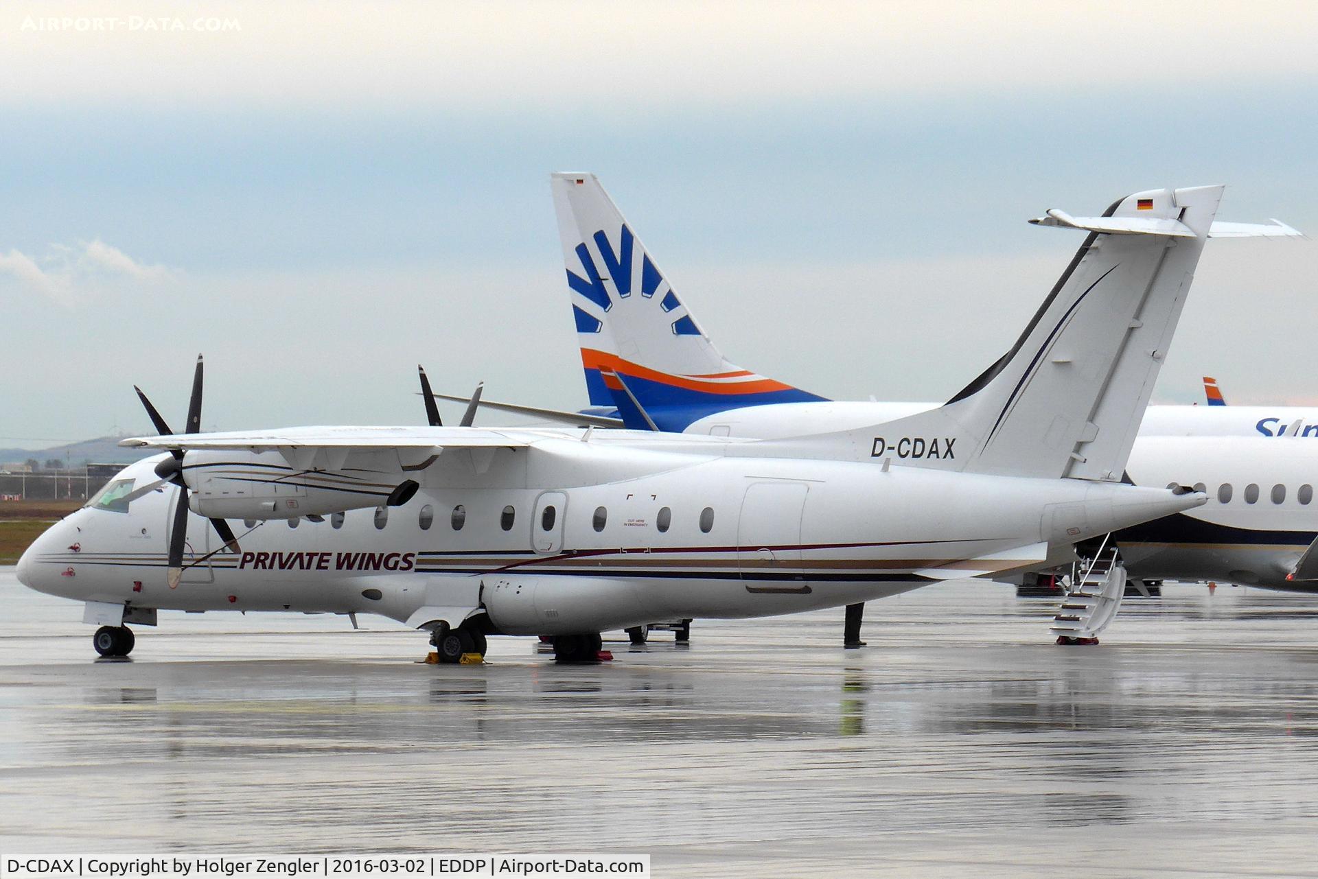 D-CDAX, 1998 Dornier 328-100 C/N 3087, Apron 1 on a rainy day.....