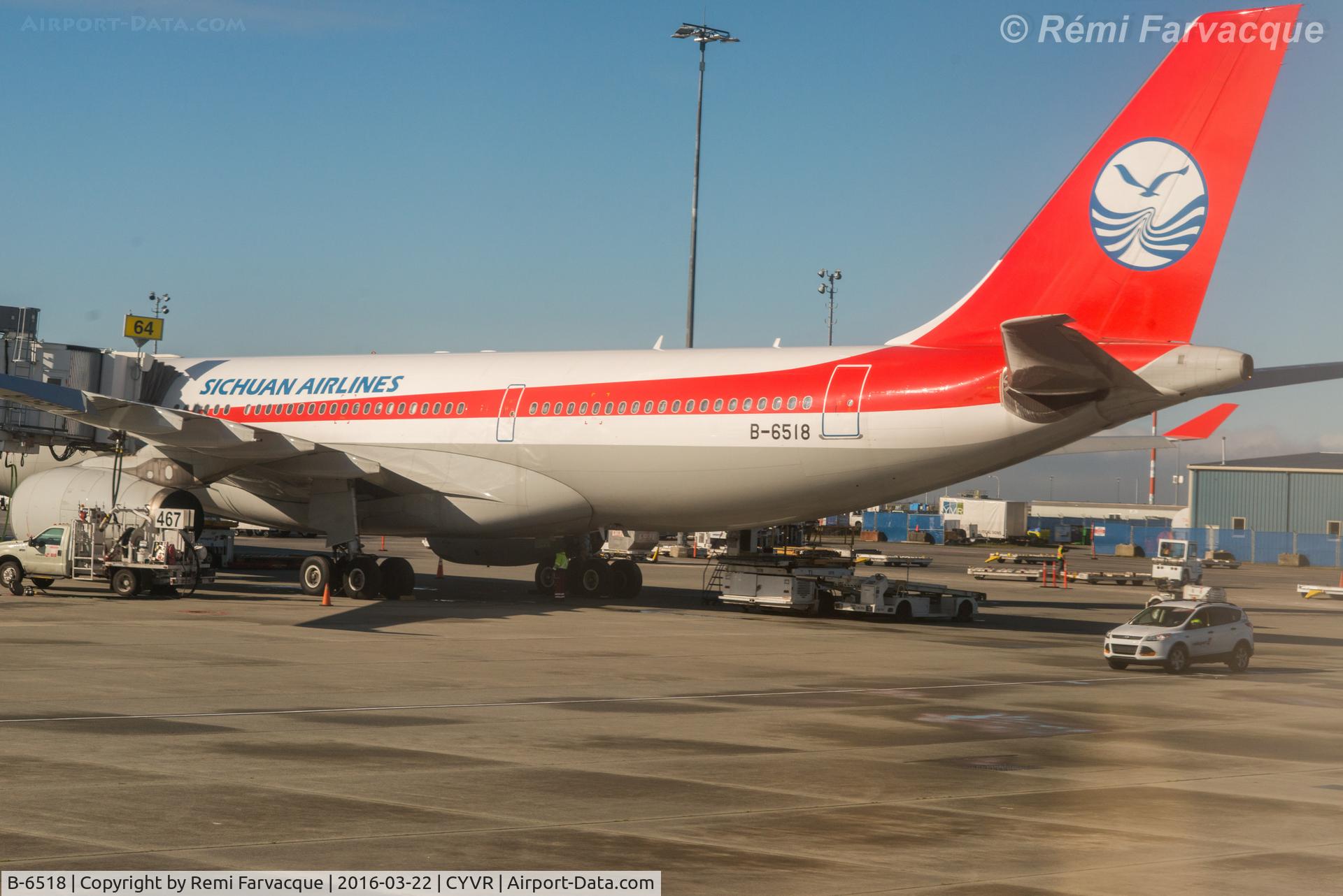 B-6518, 2010 Airbus A330-243 C/N 1082, In international wing, from a departing plane.