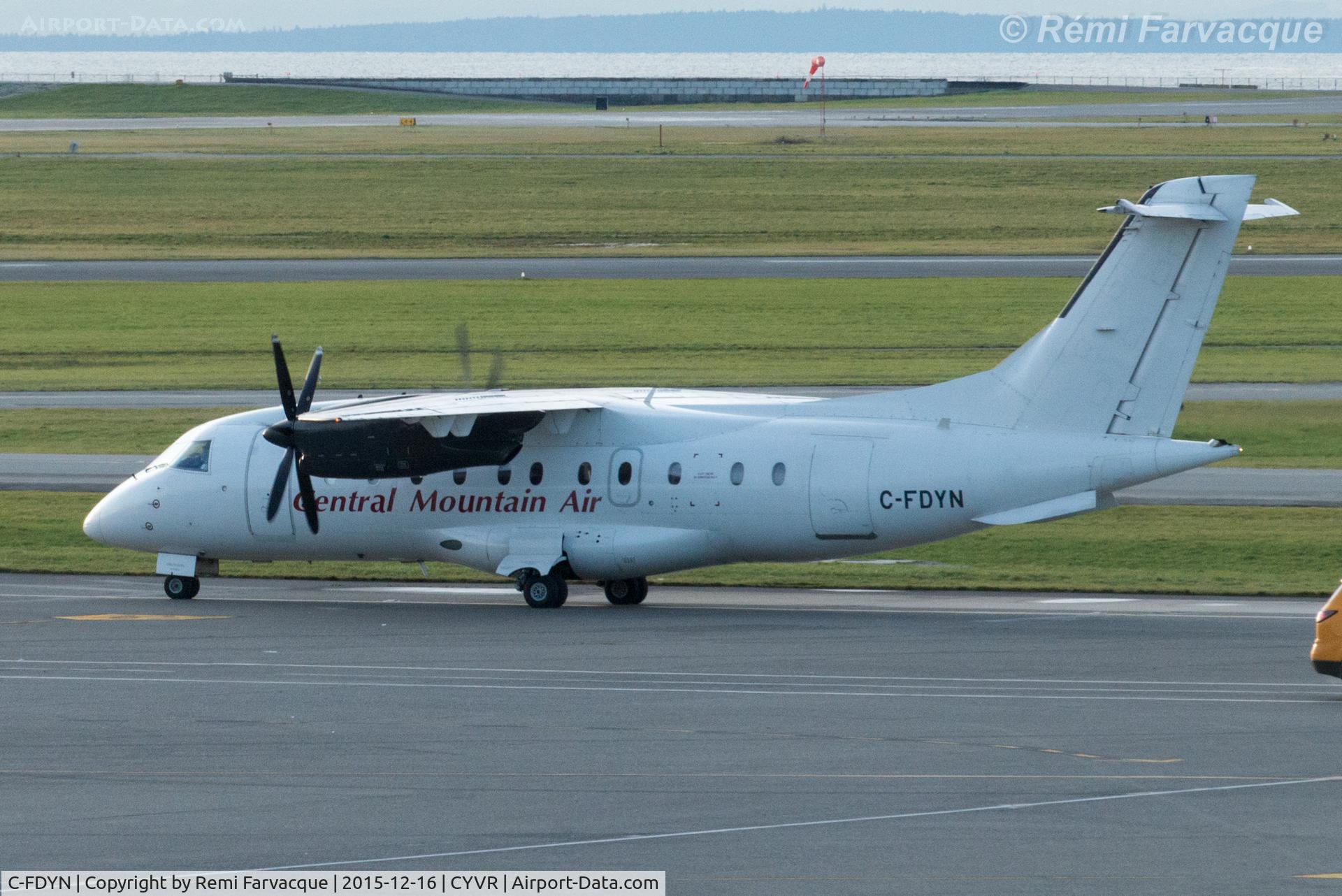 C-FDYN, 1998 Dornier 328-100 C/N 3096, Taxiing for take-off, south runway.